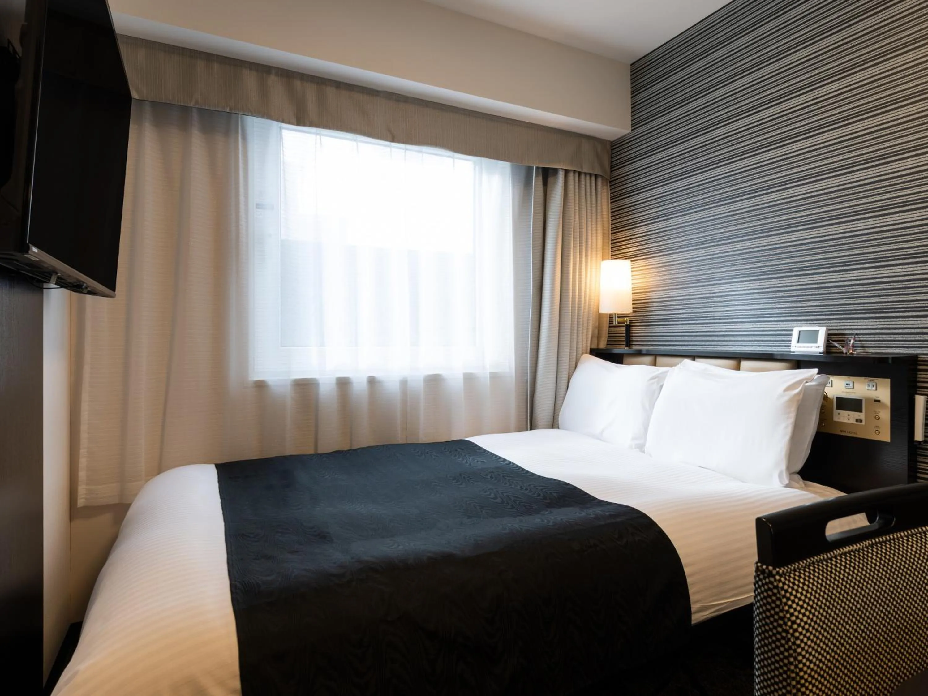 Photo of the whole room, Bed in APA Hotel Kintetsu-Nara Ekimae