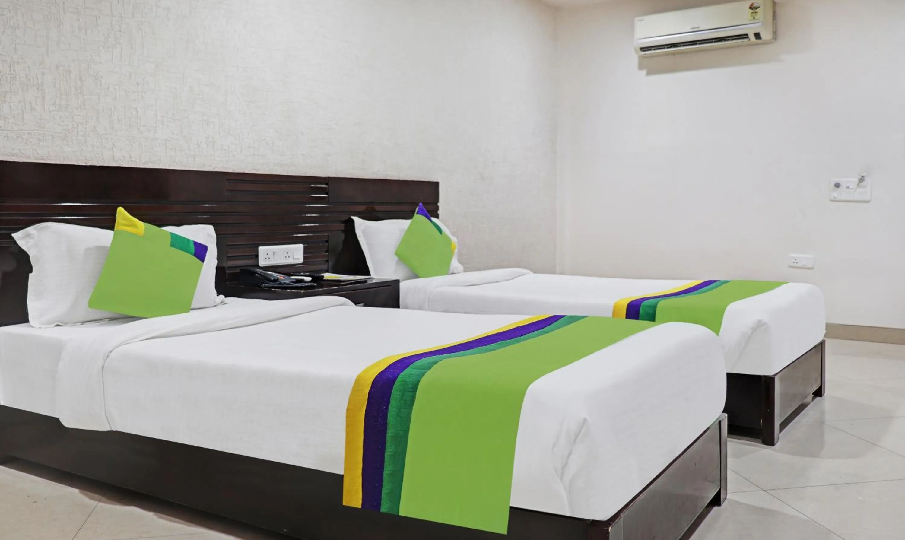 Bedroom, Bed in Treebo Elite City Upper Bazar