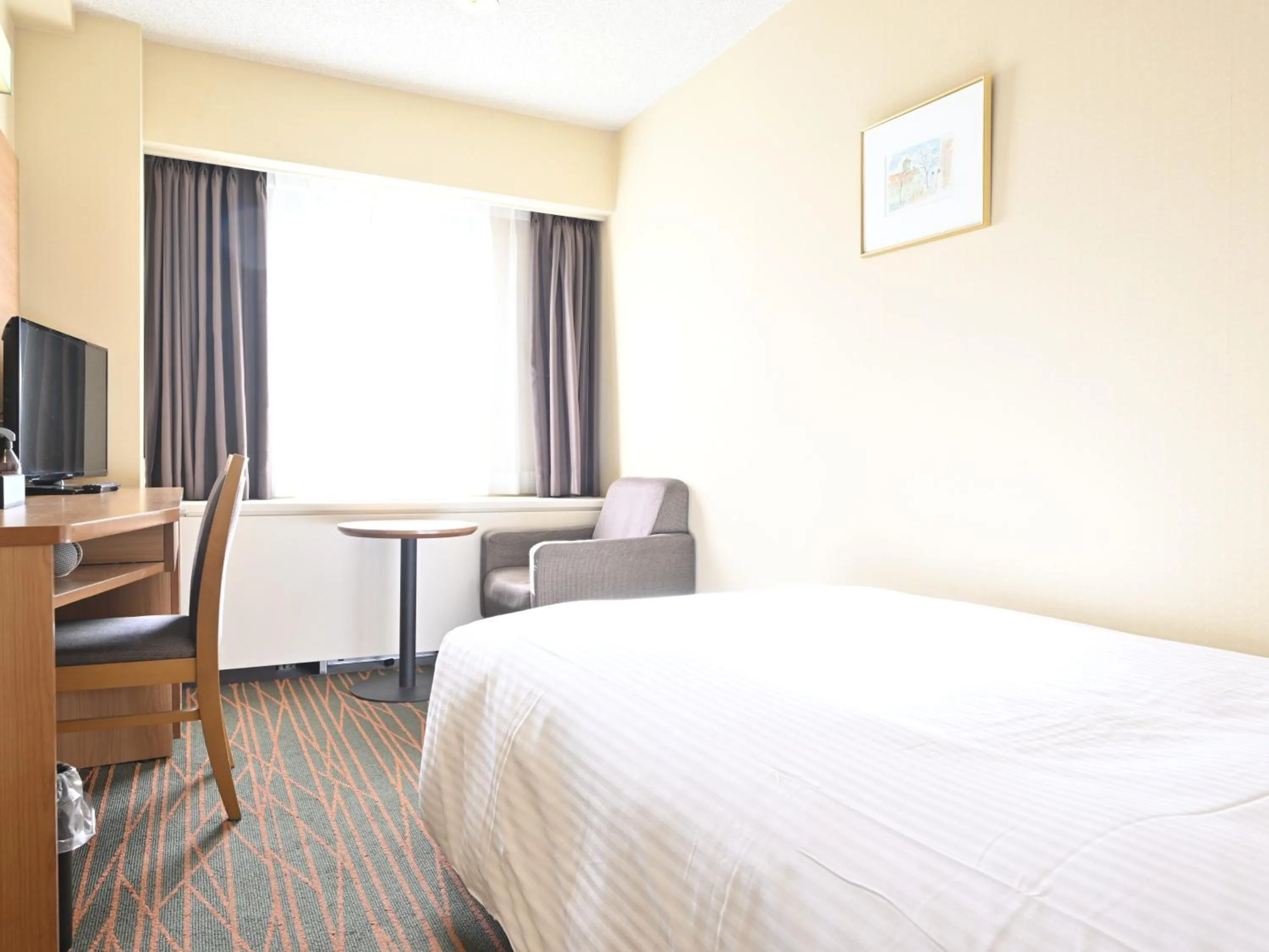 Bed in Hotel Abest Sapporo