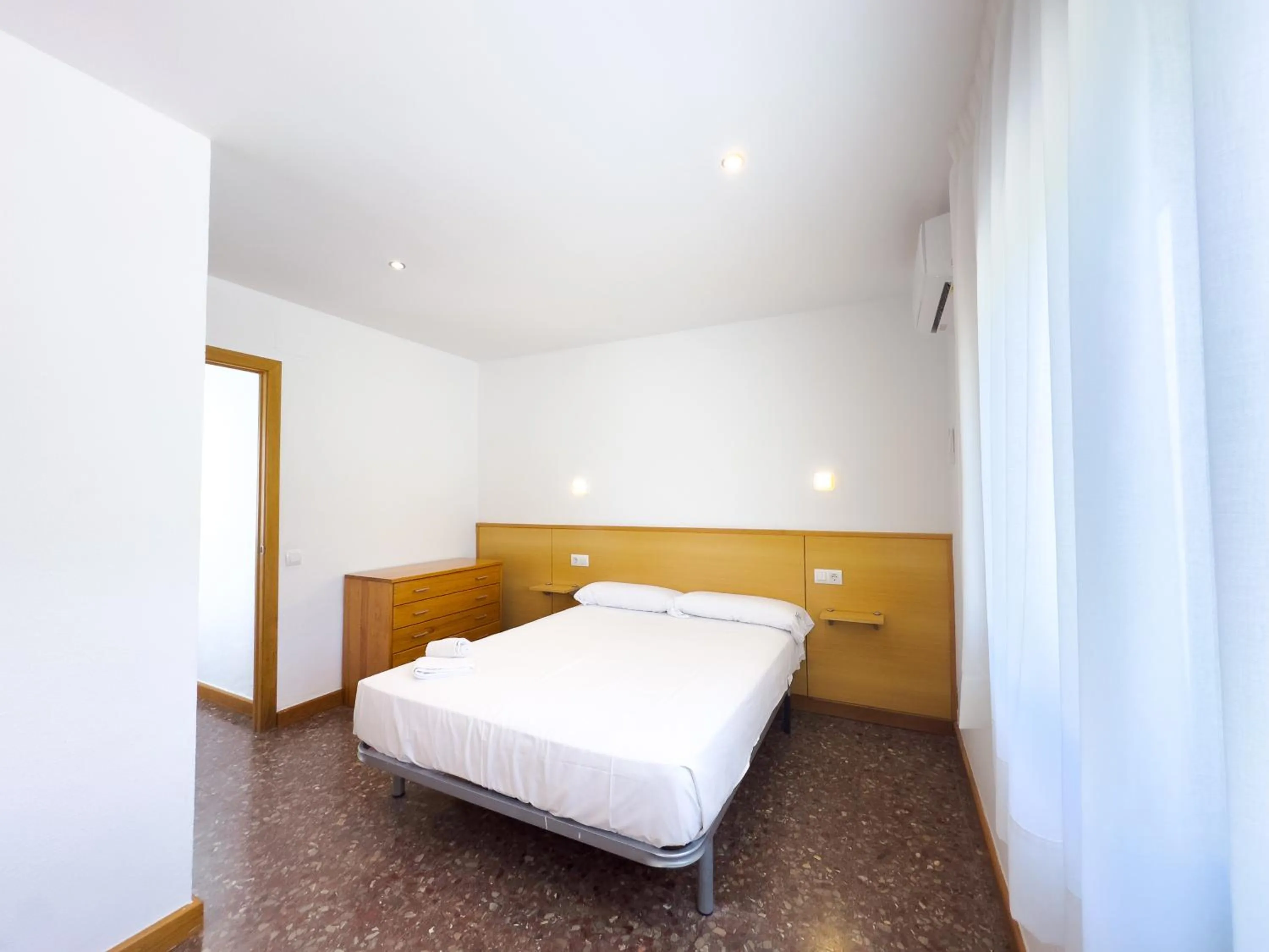 Bed in Rentalmar Atlantida Atico