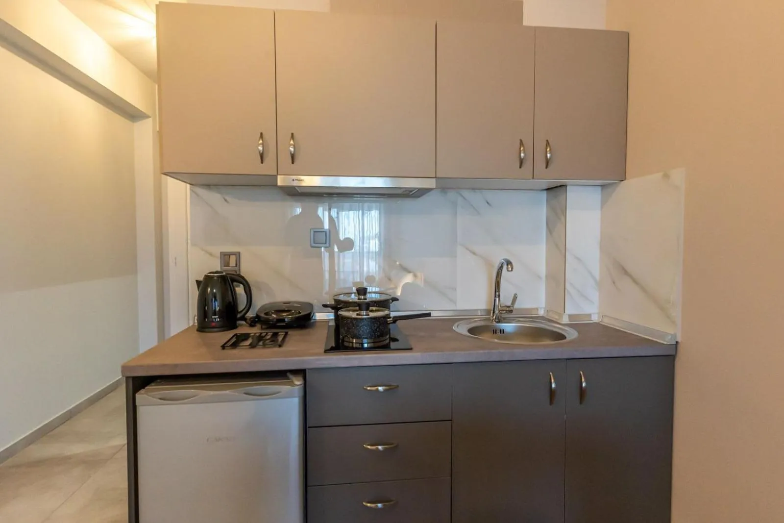 Kitchen or kitchenette in AURA APARTMENTS