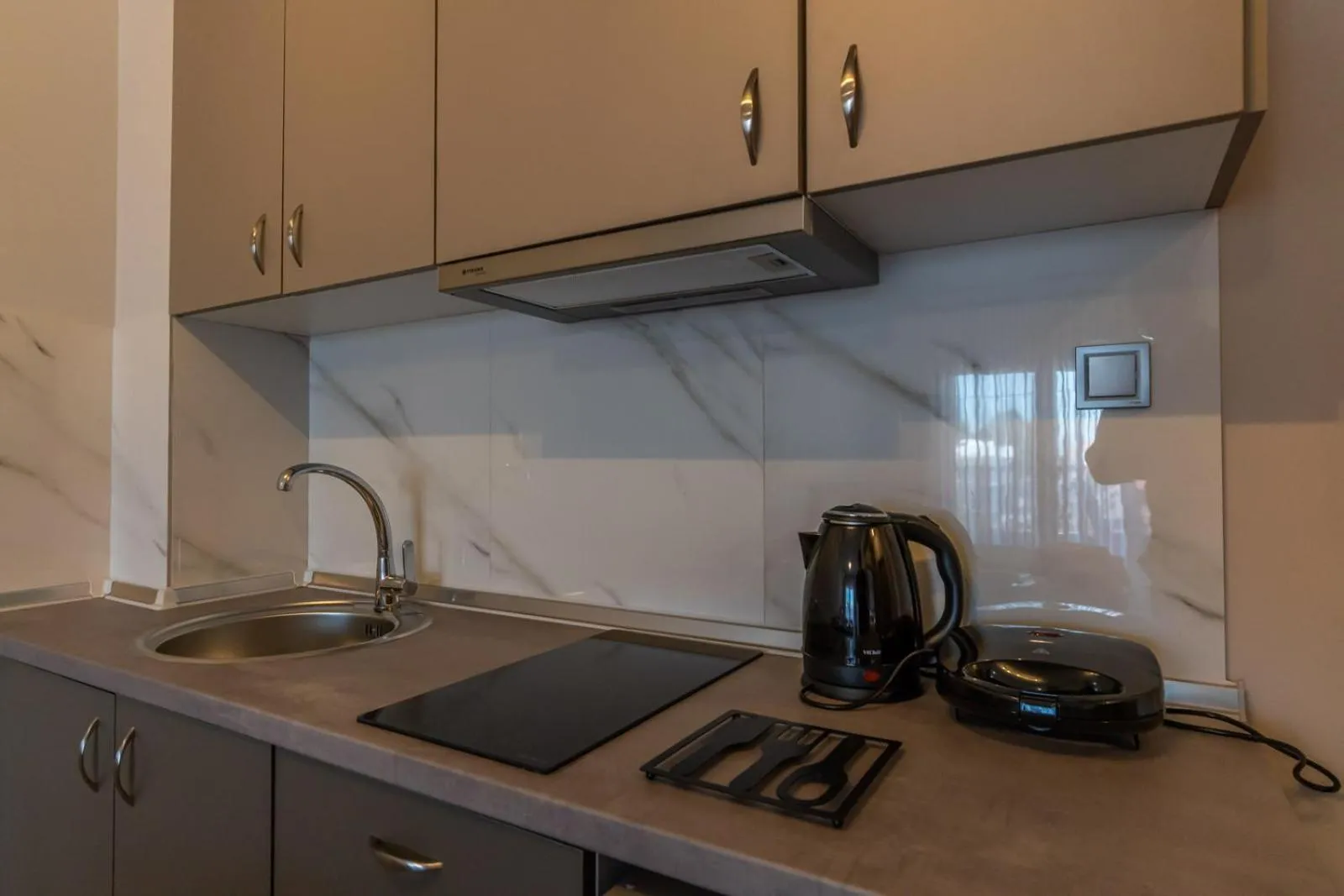 Kitchen or kitchenette in AURA APARTMENTS