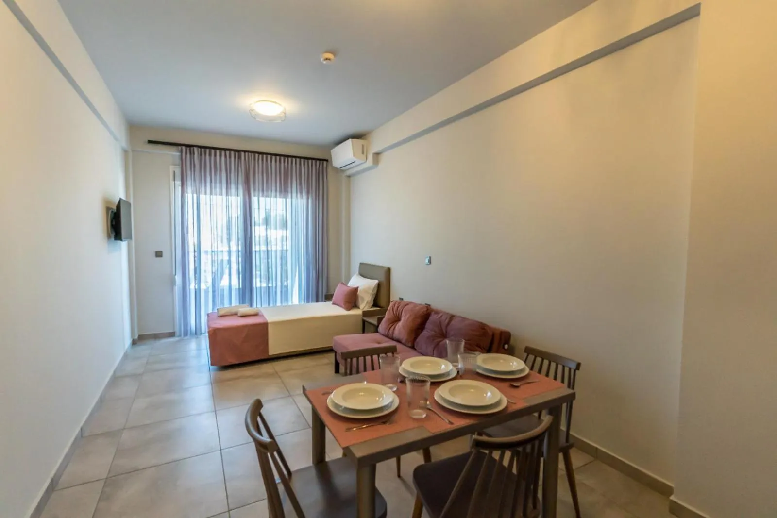 Bed in AURA APARTMENTS