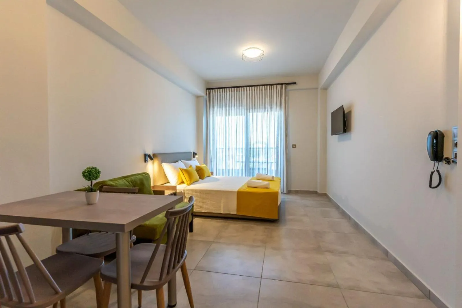 Dining area, Bed in AURA APARTMENTS