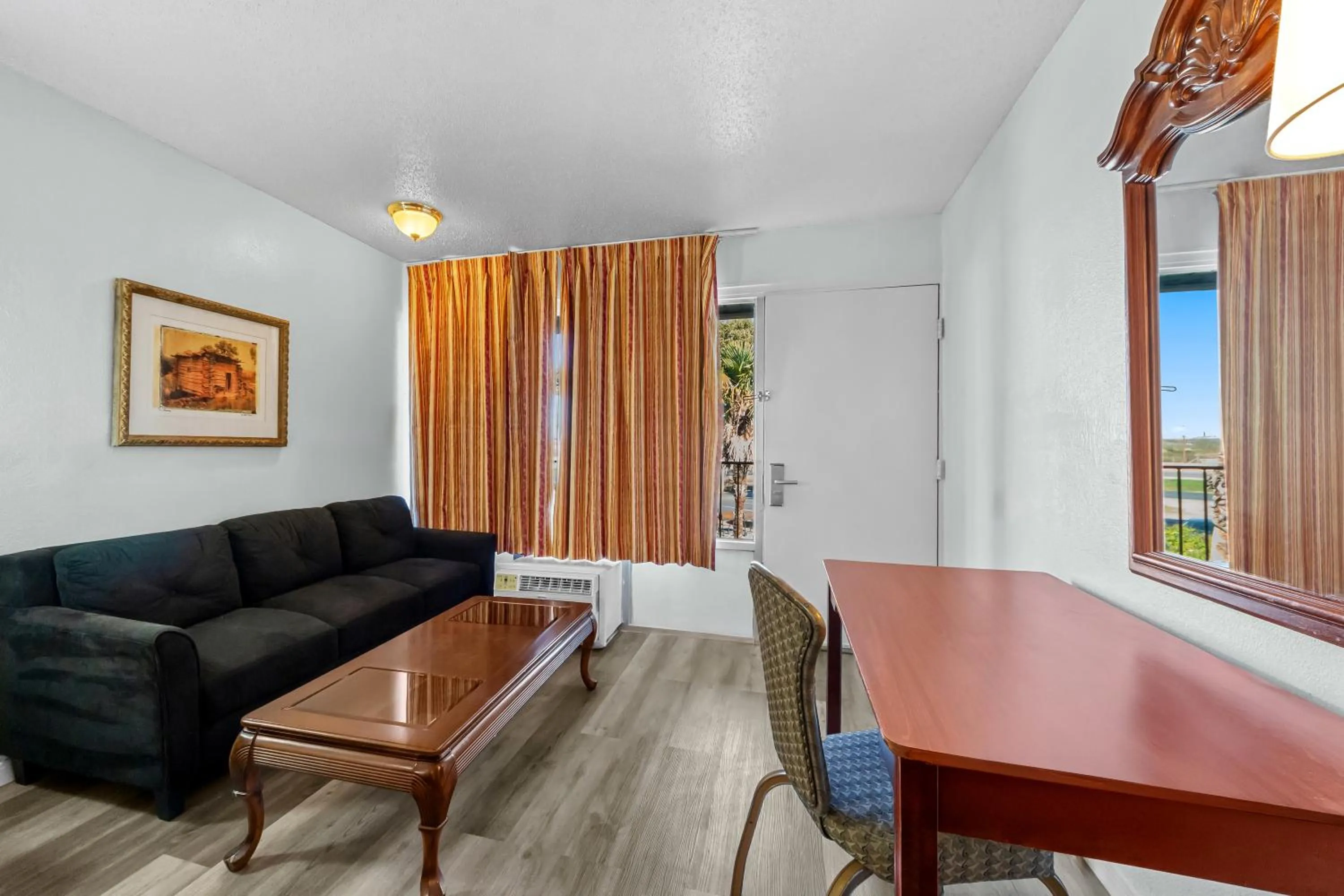 Seating area in Knights Inn San Antonio near Frost Bank Center