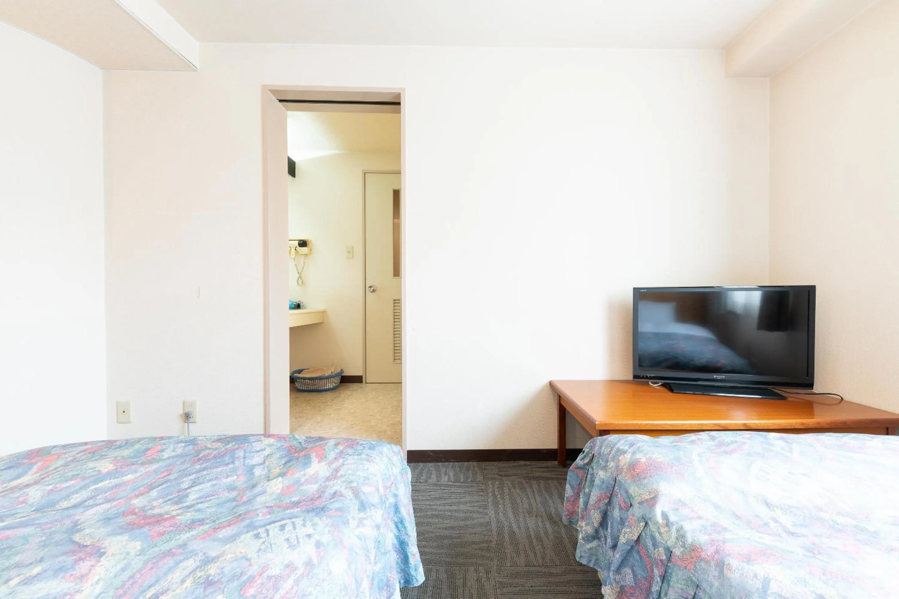 Bed in Tabist Hotel Diana Yachiyodai