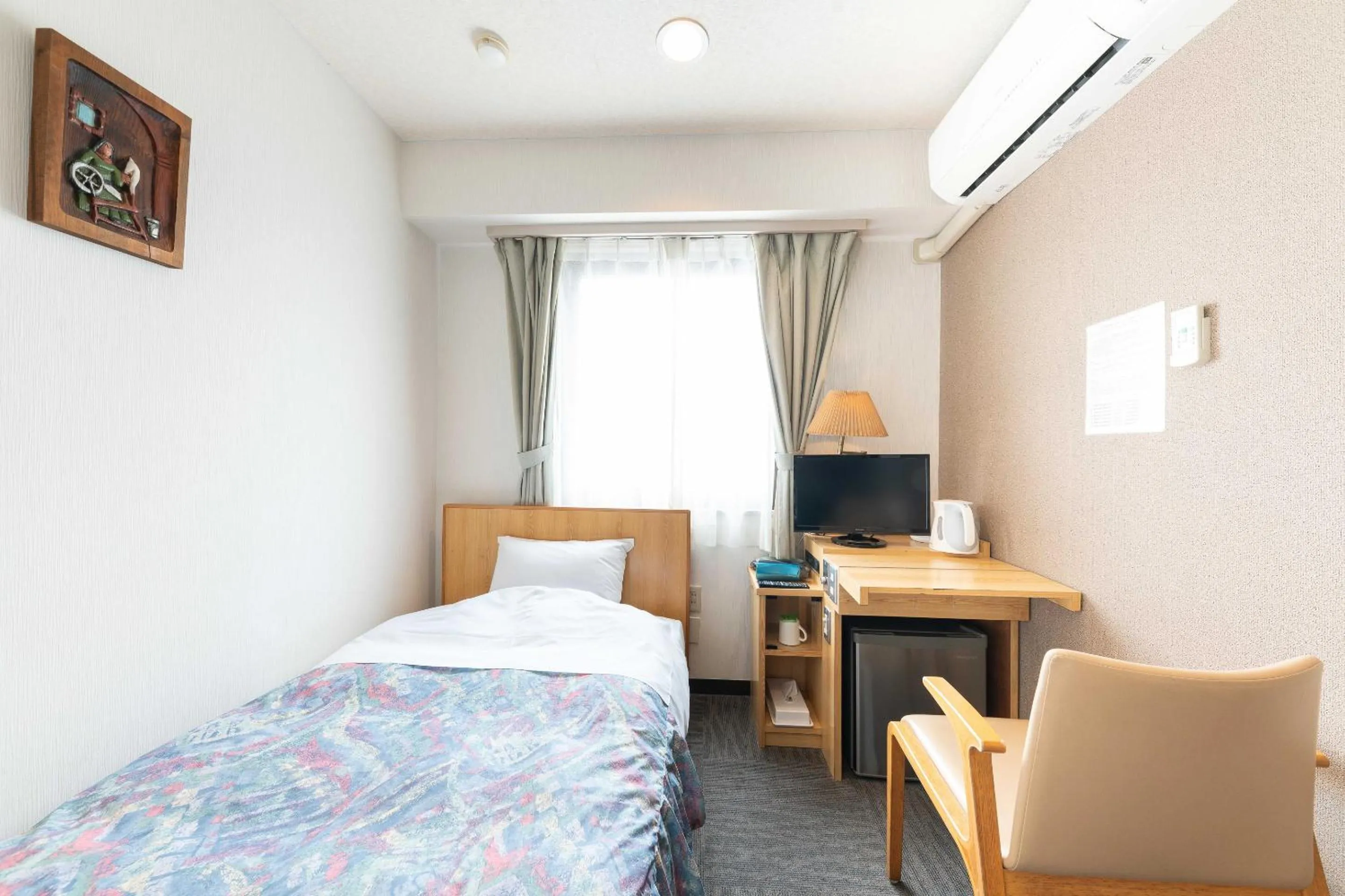 Bed in Tabist Hotel Diana Yachiyodai