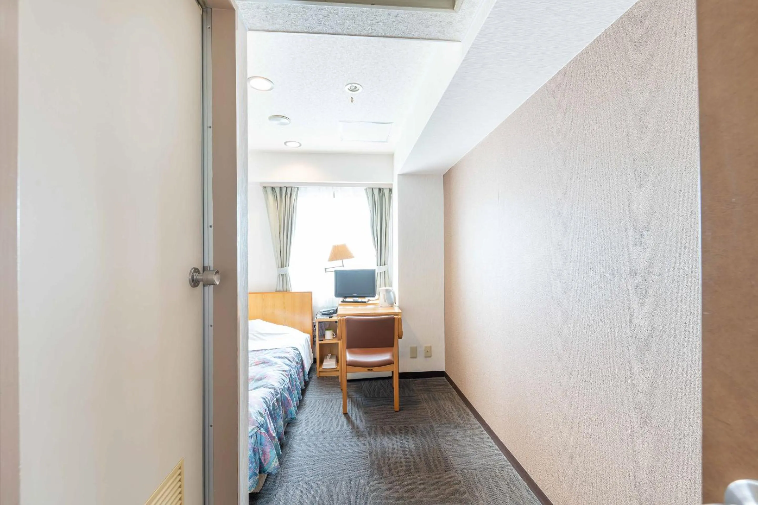 Bed in Tabist Hotel Diana Yachiyodai