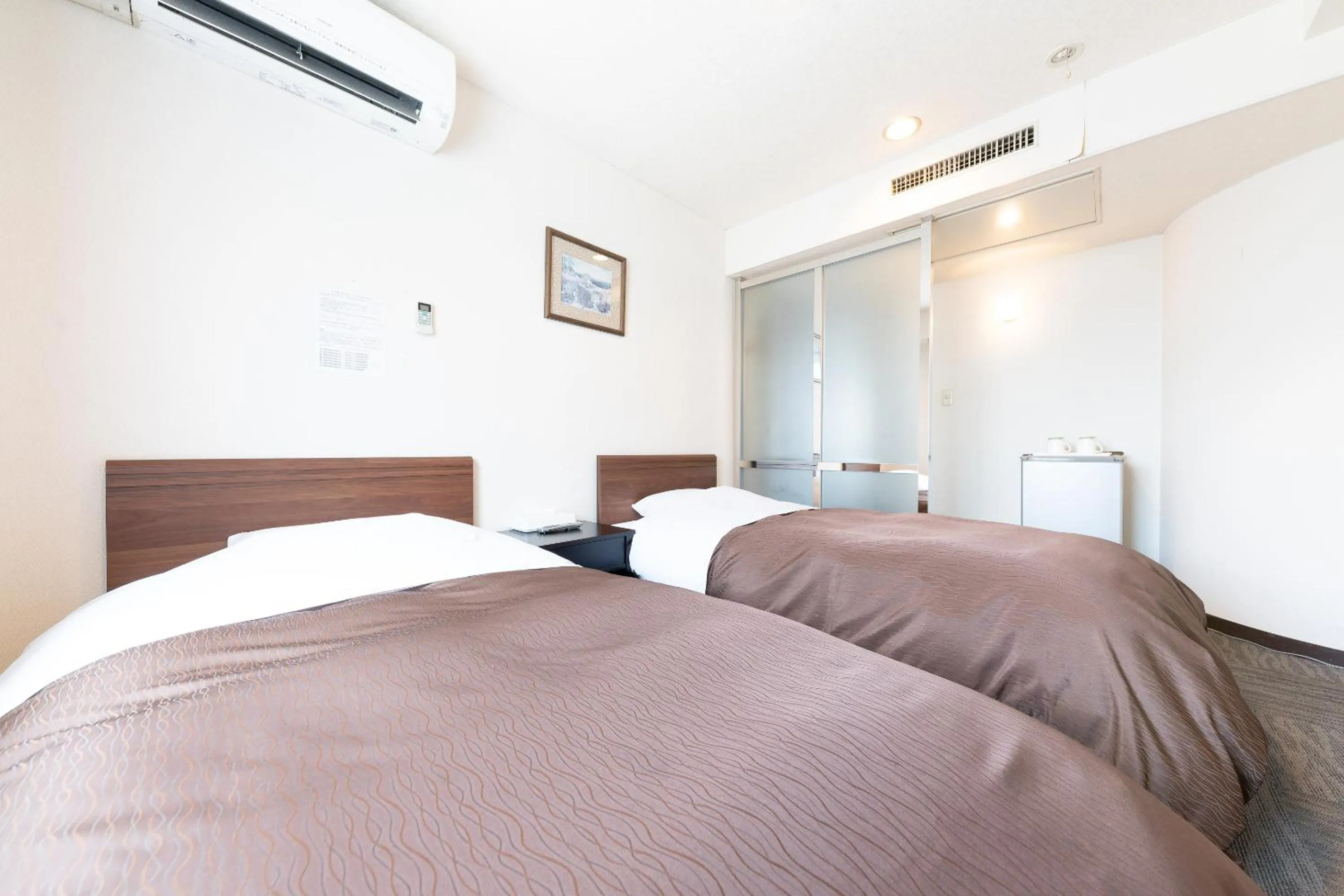 Bed in Tabist Hotel Diana Yachiyodai