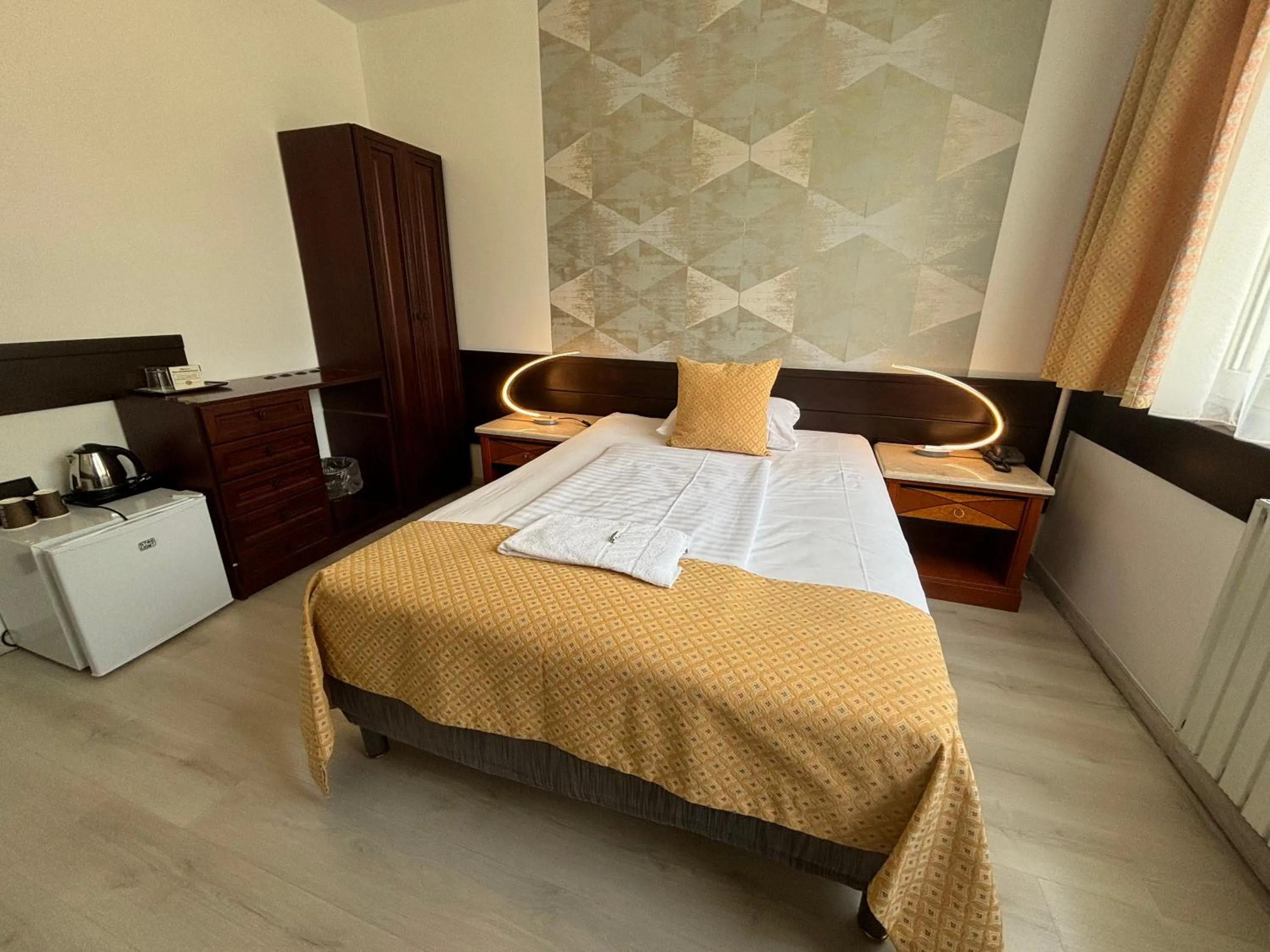 Bed in Hotel Gloria Budapest City Center