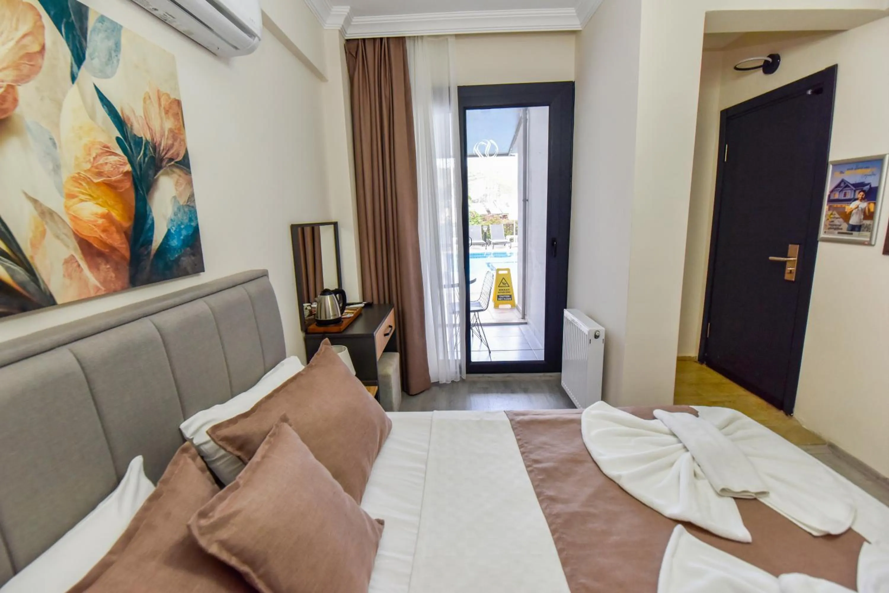 Bed in Mykonut Boutique Suites