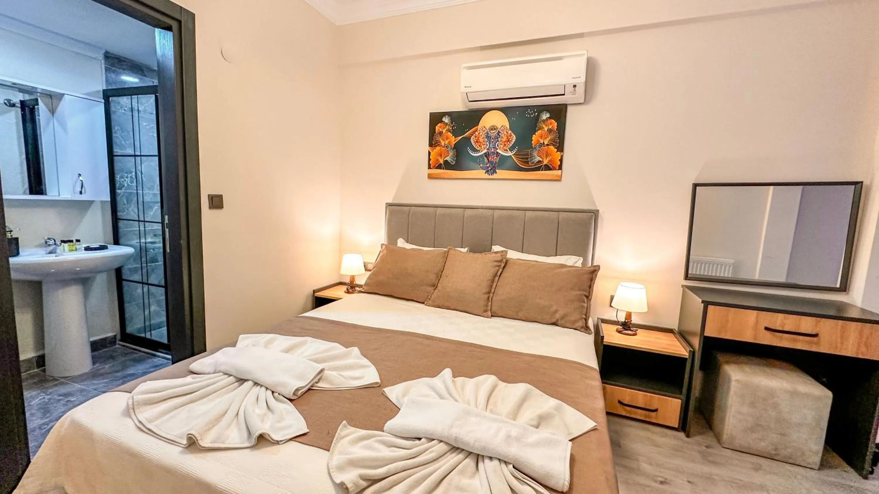 Bed in Mykonut Boutique Suites