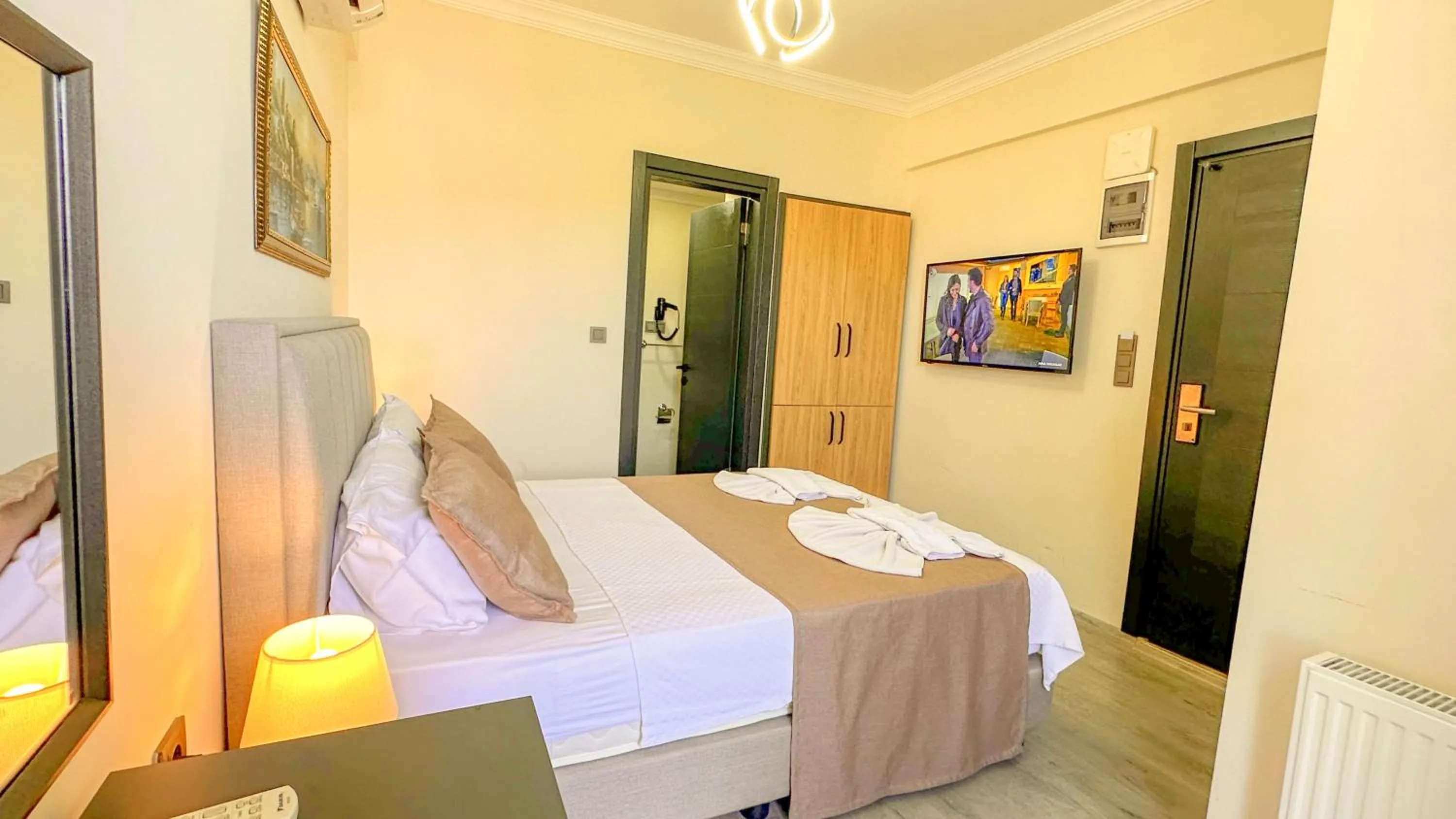 Bed in Mykonut Boutique Suites