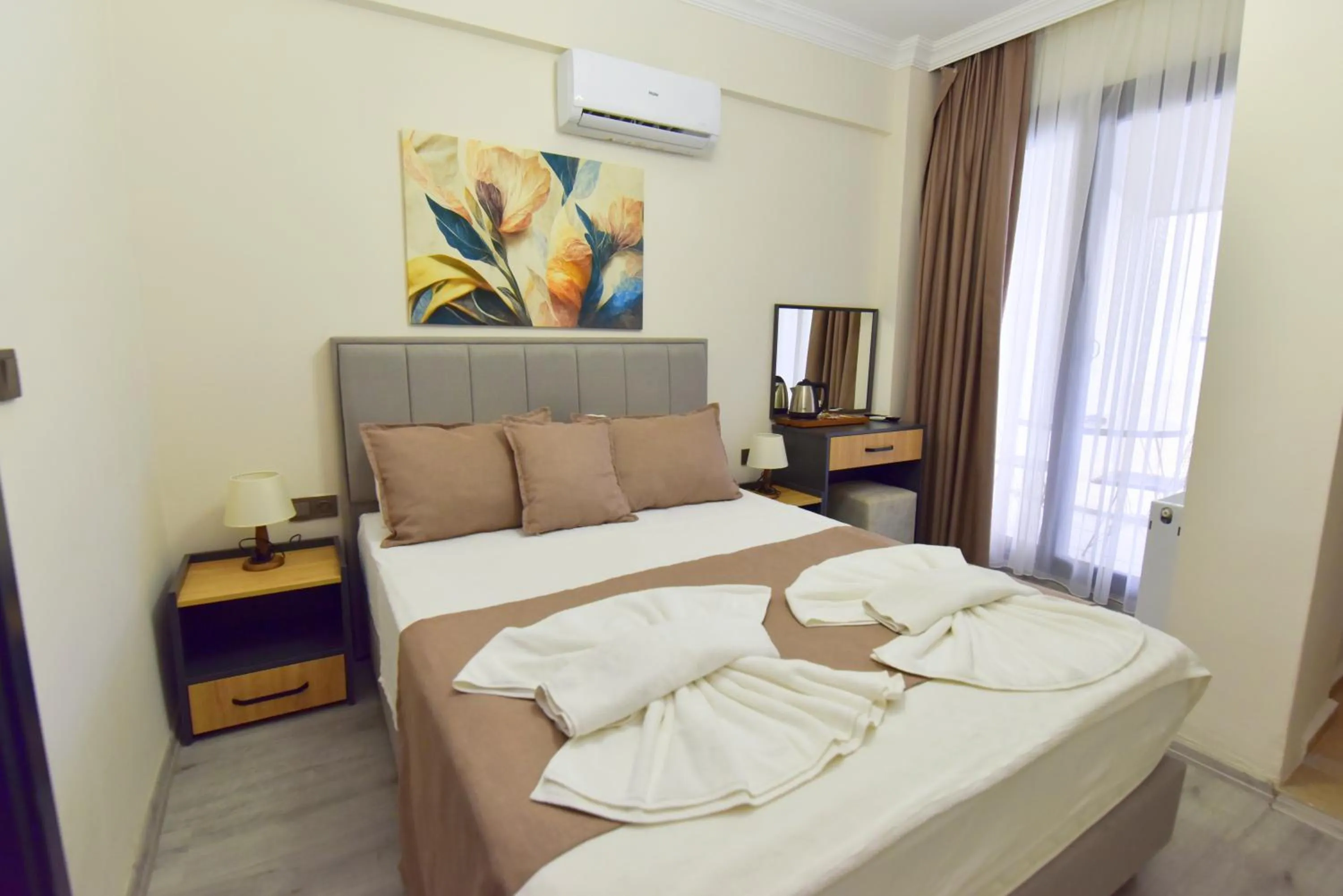 Bed in Mykonut Boutique Suites