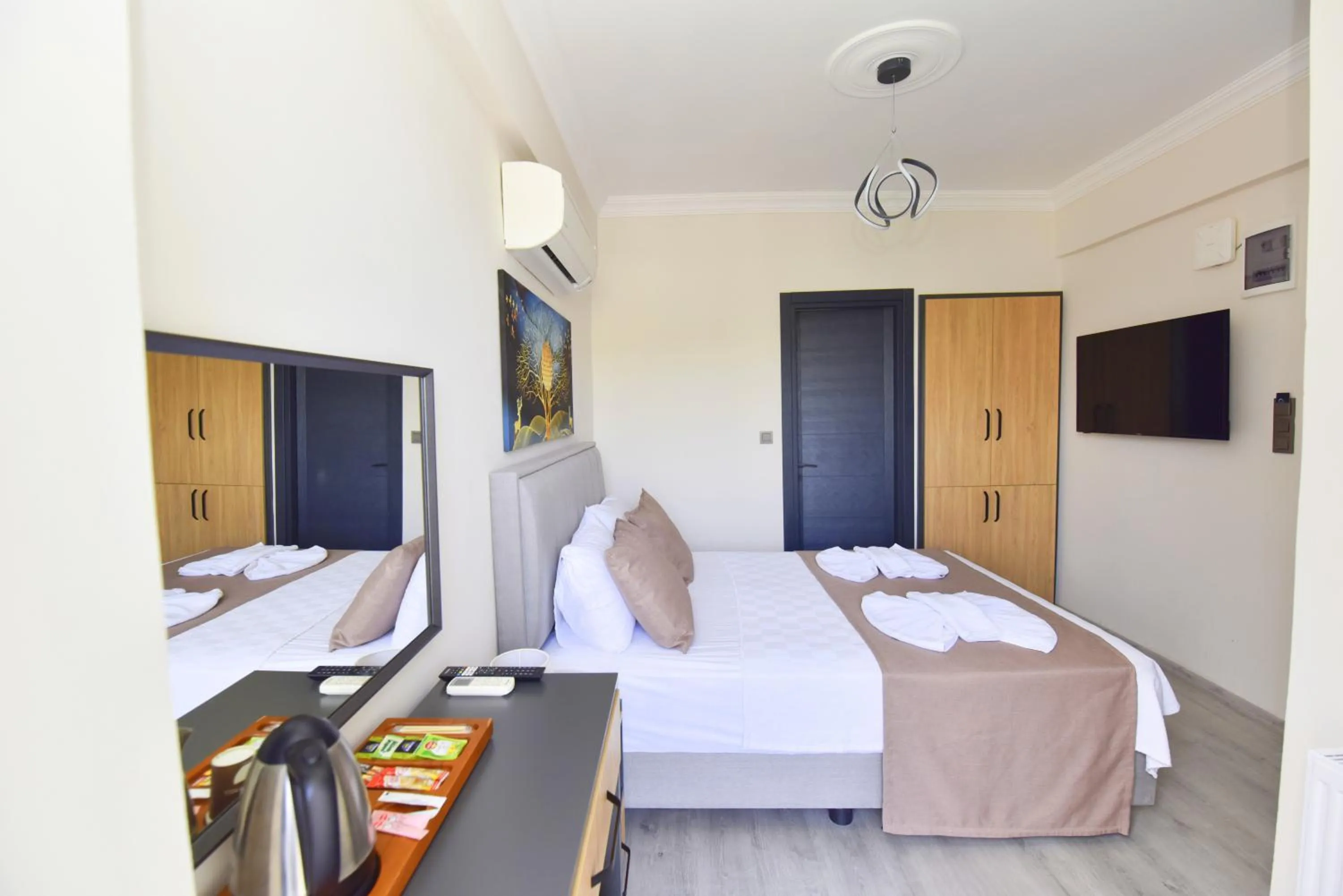 Bed in Mykonut Boutique Suites