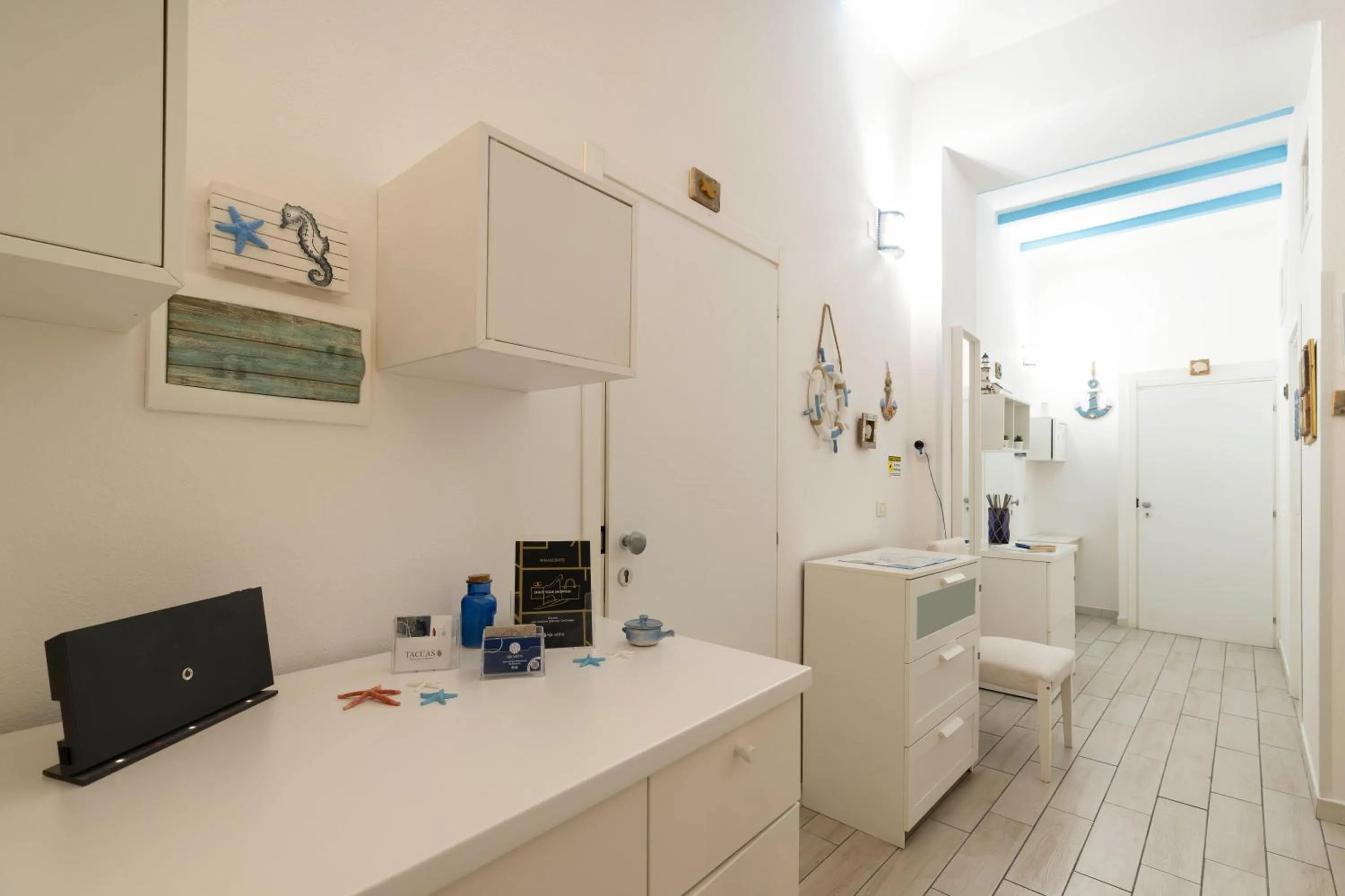 Communal lounge/ TV room in Approdo Rooms - Eja Sardinia