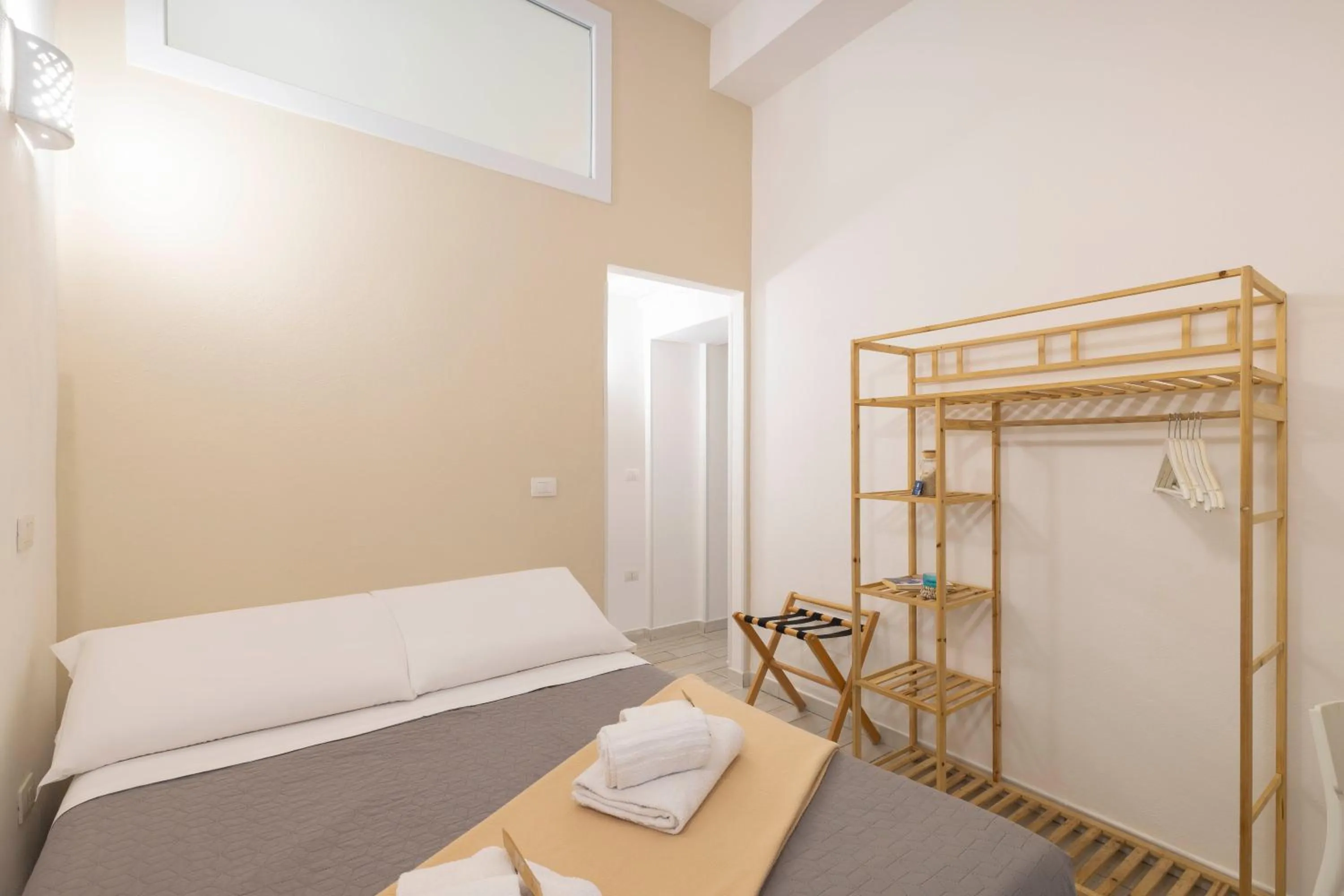 Bed in Approdo Rooms - Eja Sardinia