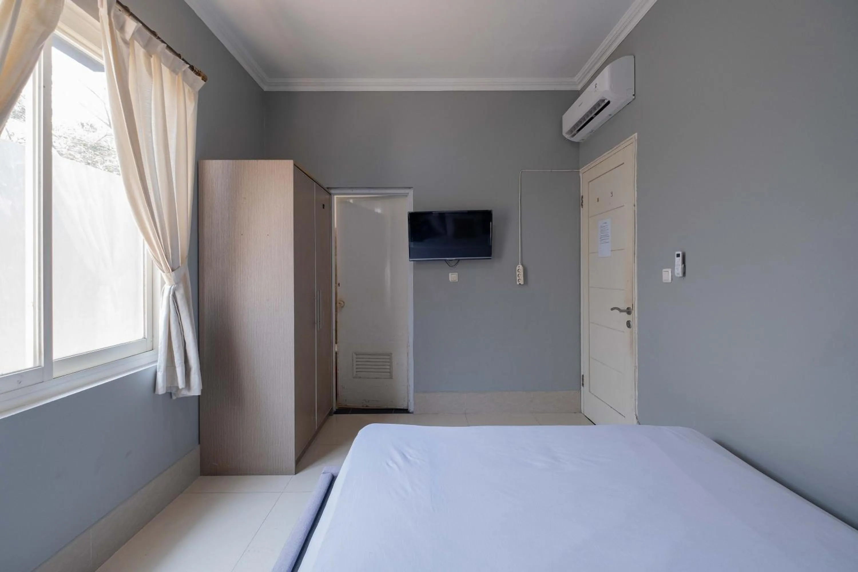 Bed in Urbanview Hotel Stariez Karawaci Tangerang by RedDoorz