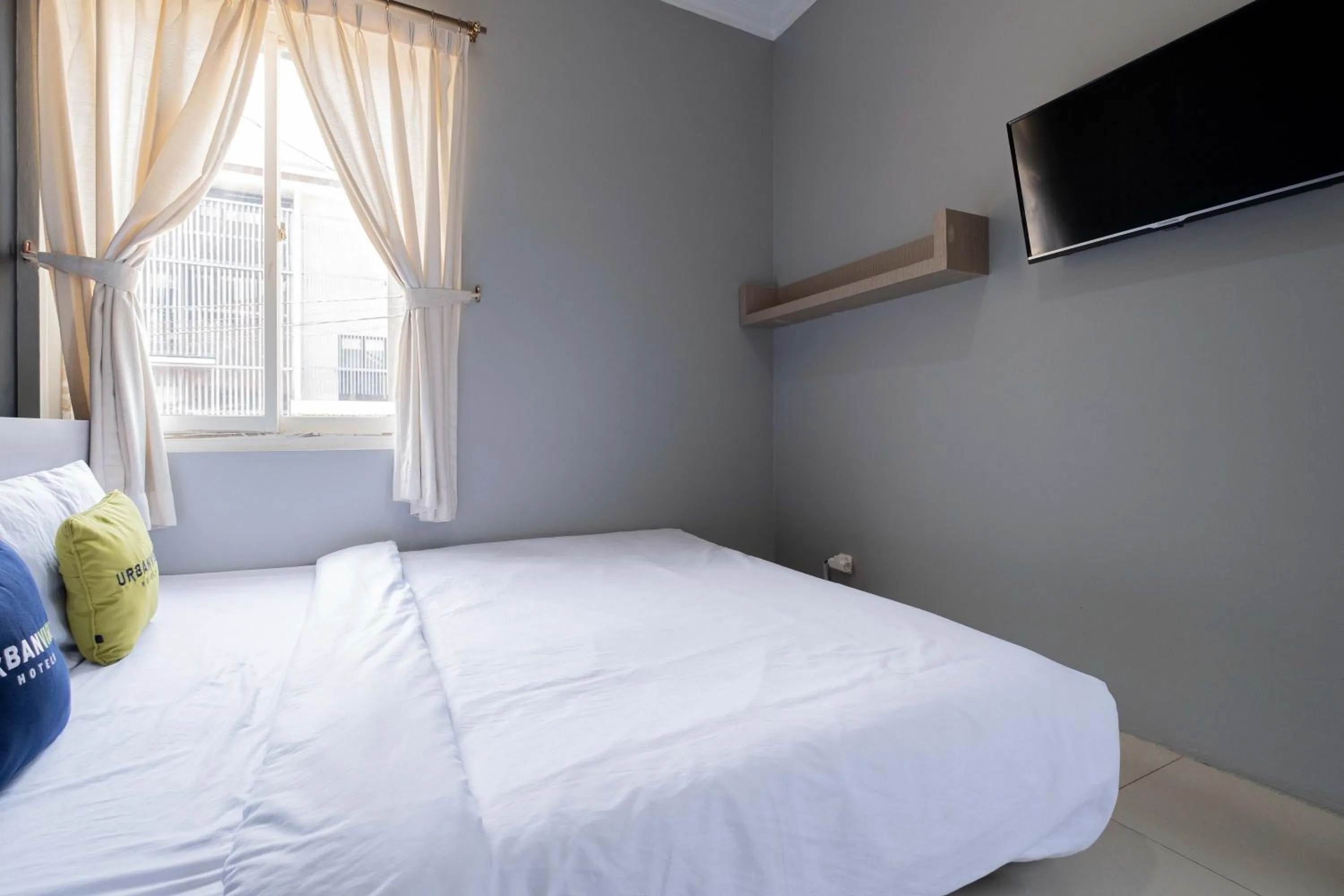 Bed in Urbanview Hotel Stariez Karawaci Tangerang by RedDoorz