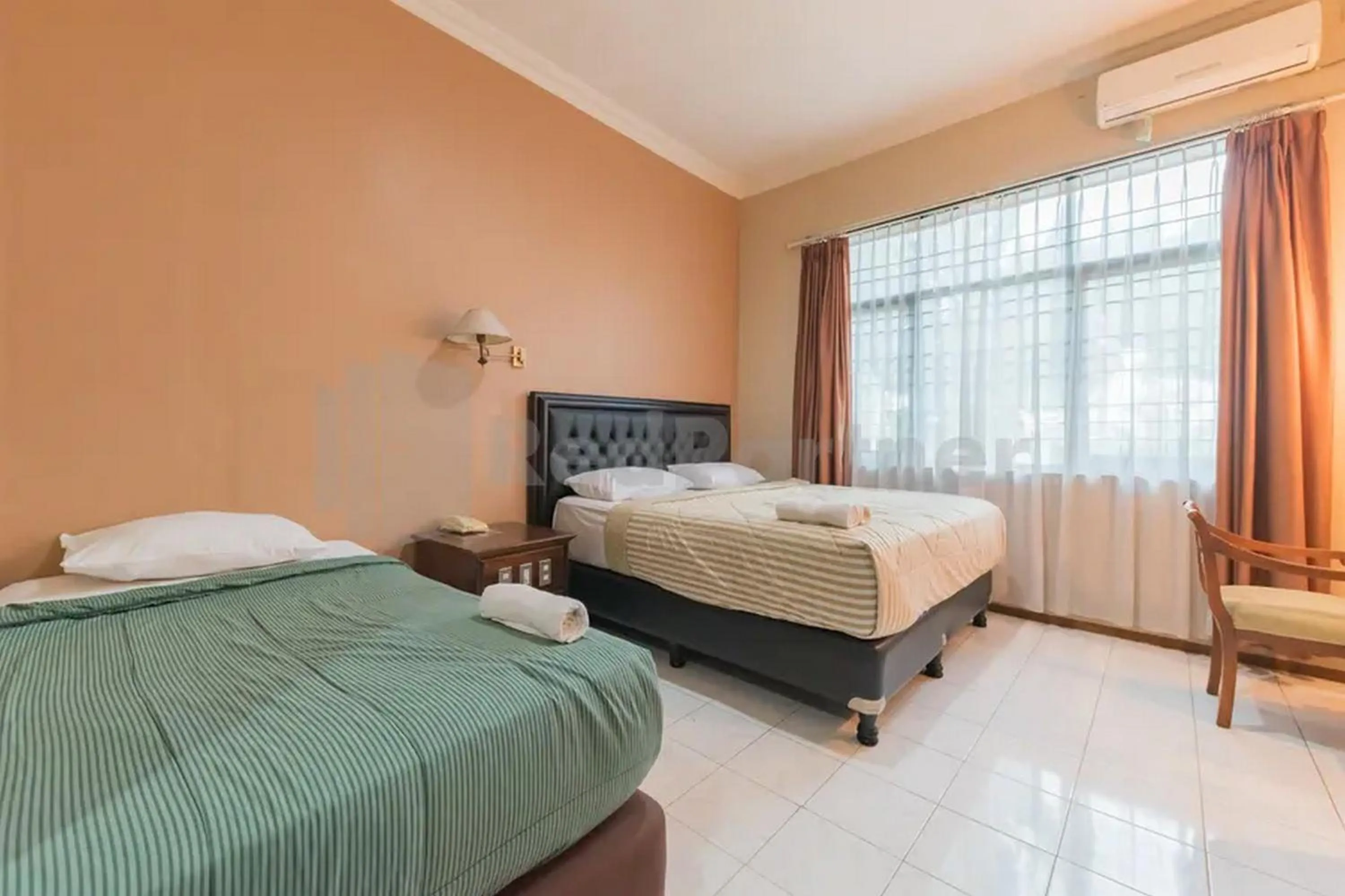 Bed in Hotel Ayong Linggarjati Kuningan Mitra RedDoorz