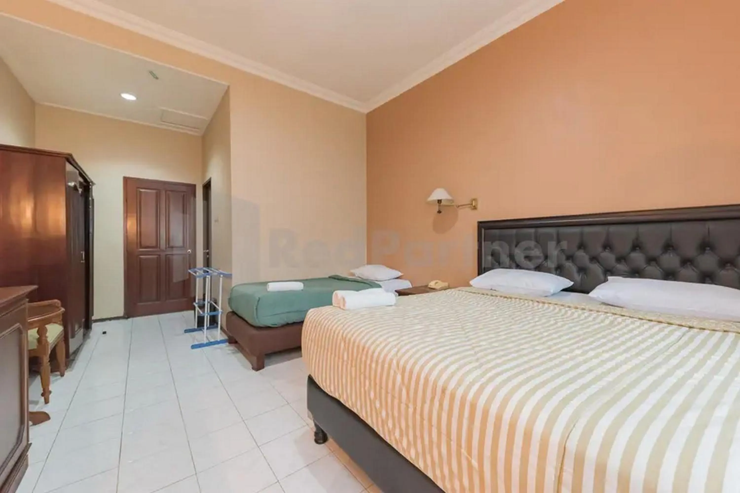 Bed in Hotel Ayong Linggarjati Kuningan Mitra RedDoorz