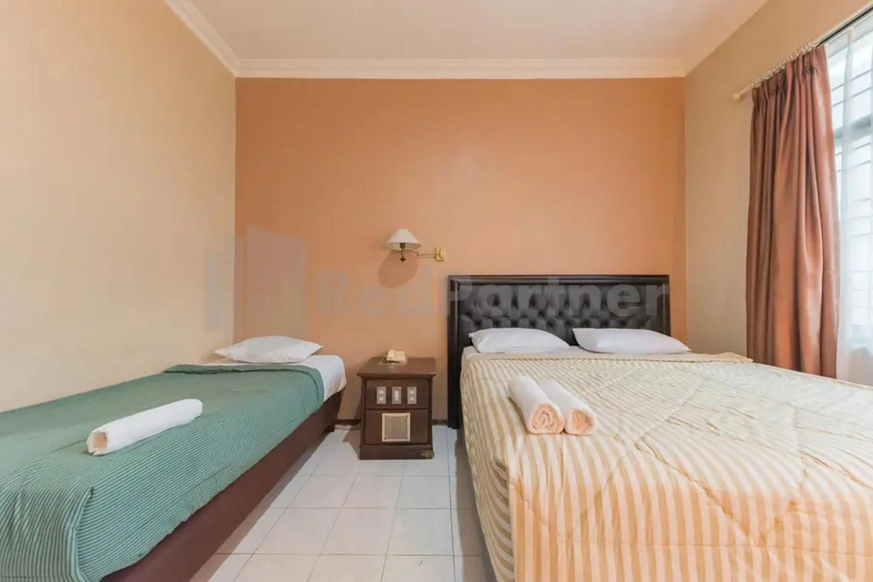 Bed in Hotel Ayong Linggarjati Kuningan Mitra RedDoorz