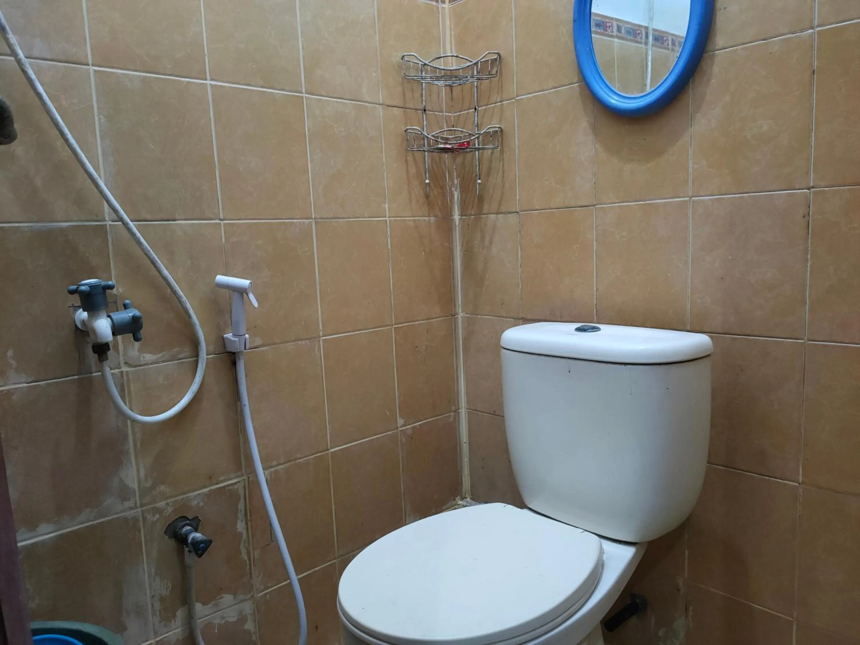 Bathroom in Hotel O Baruga Makassar