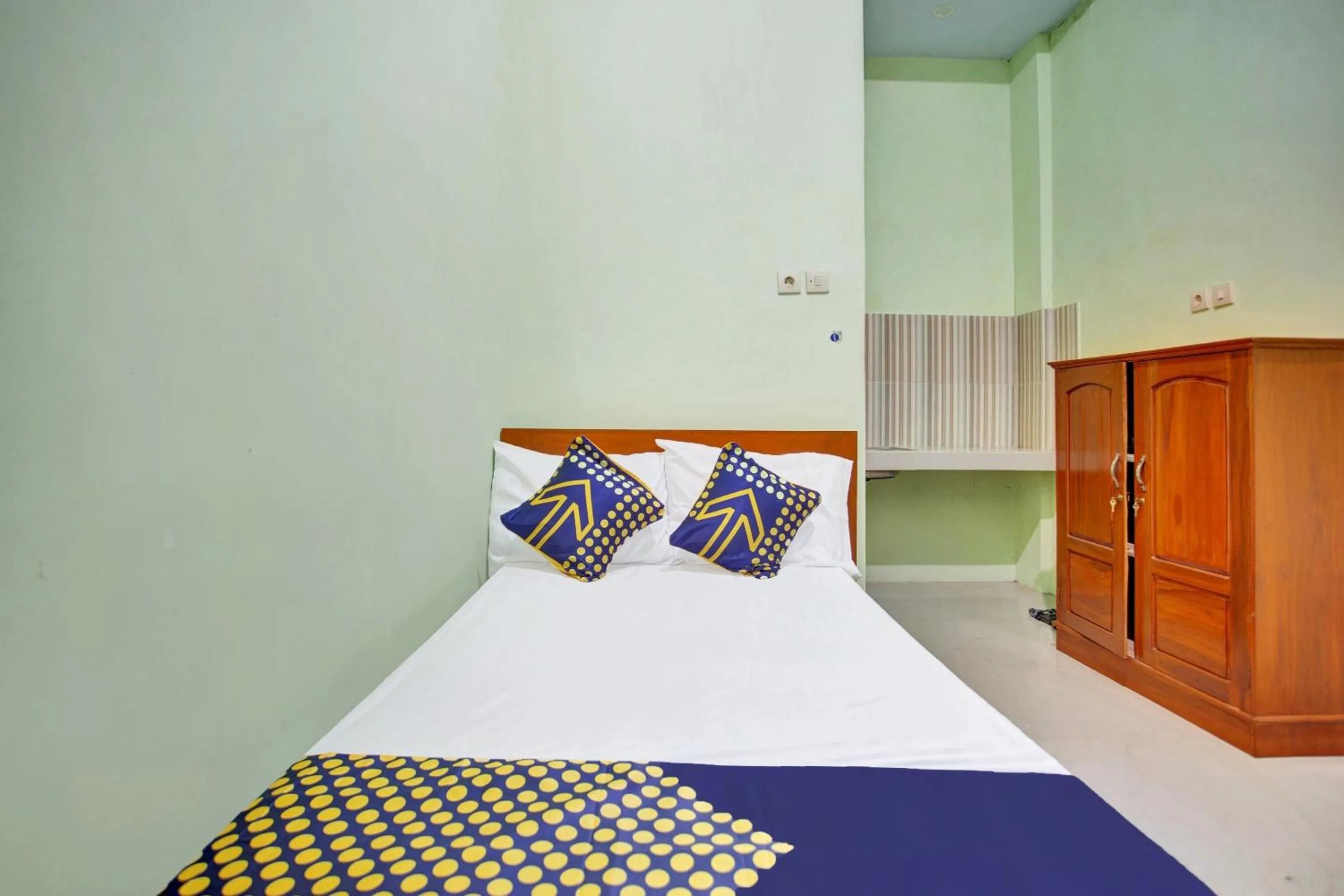 Bedroom in OYO 90537 De Wisma Emas