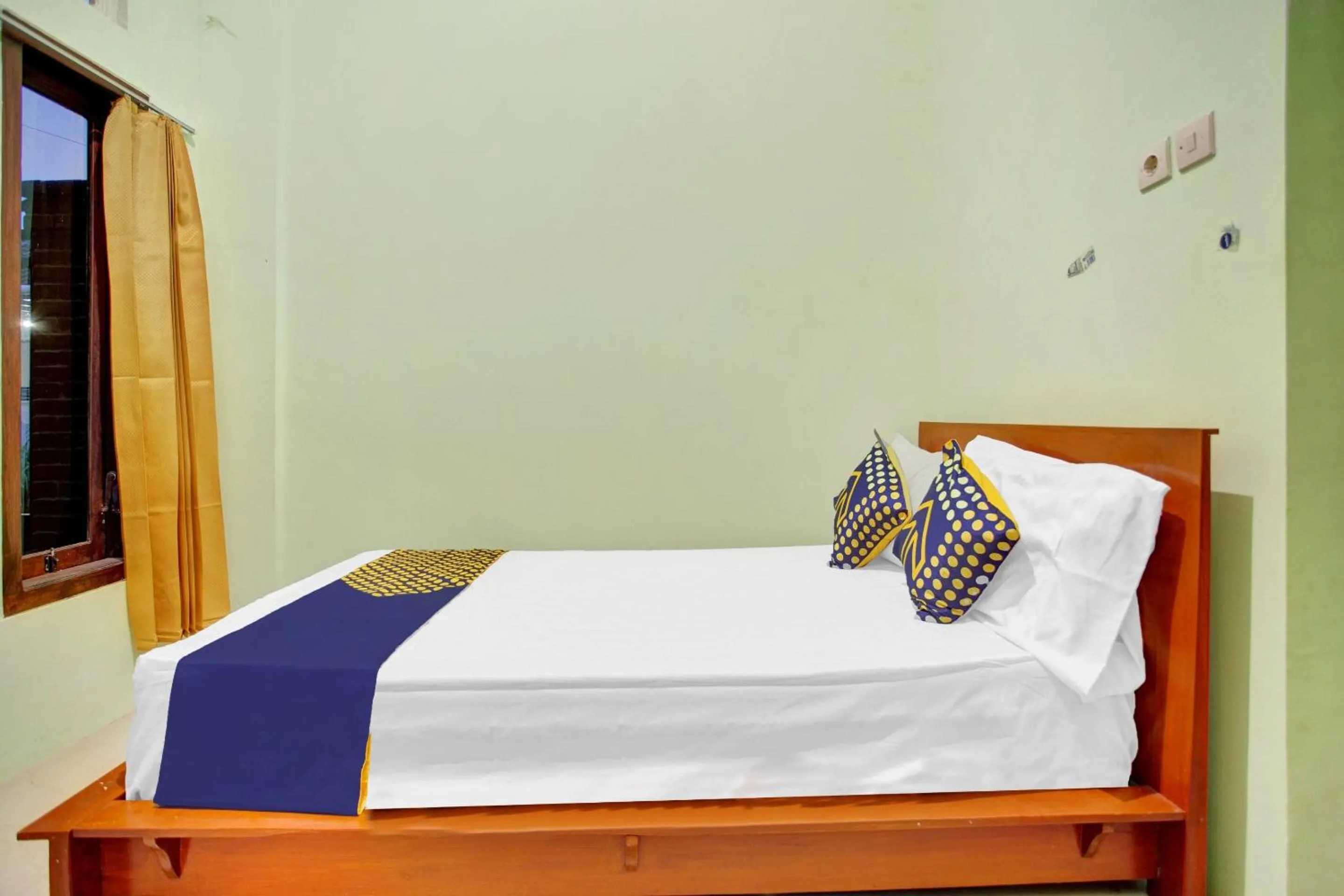 Bedroom in OYO 90537 De Wisma Emas