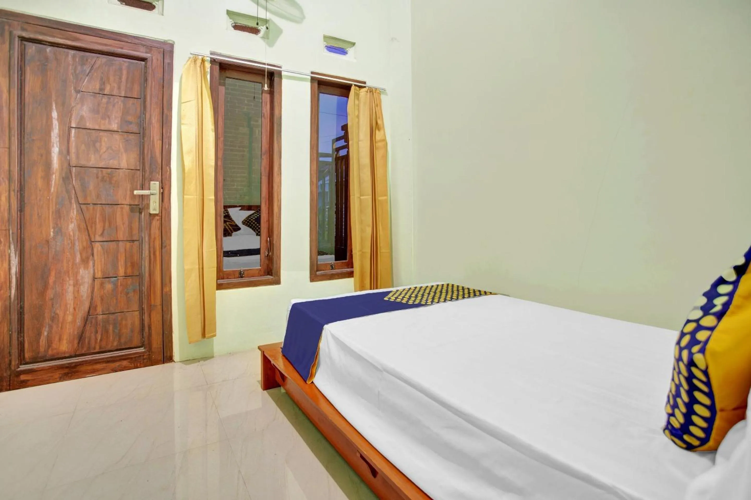 Bedroom in OYO 90537 De Wisma Emas