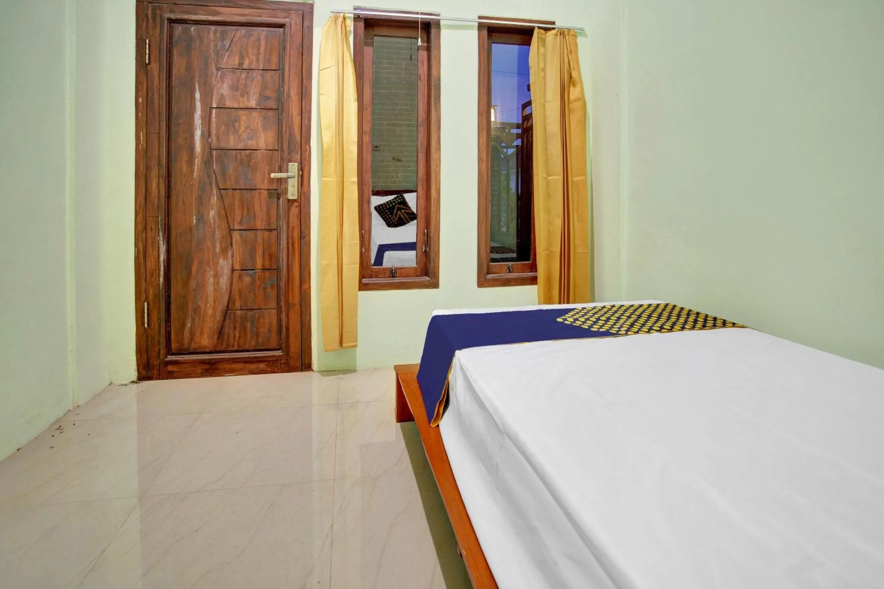 Bedroom in OYO 90537 De Wisma Emas