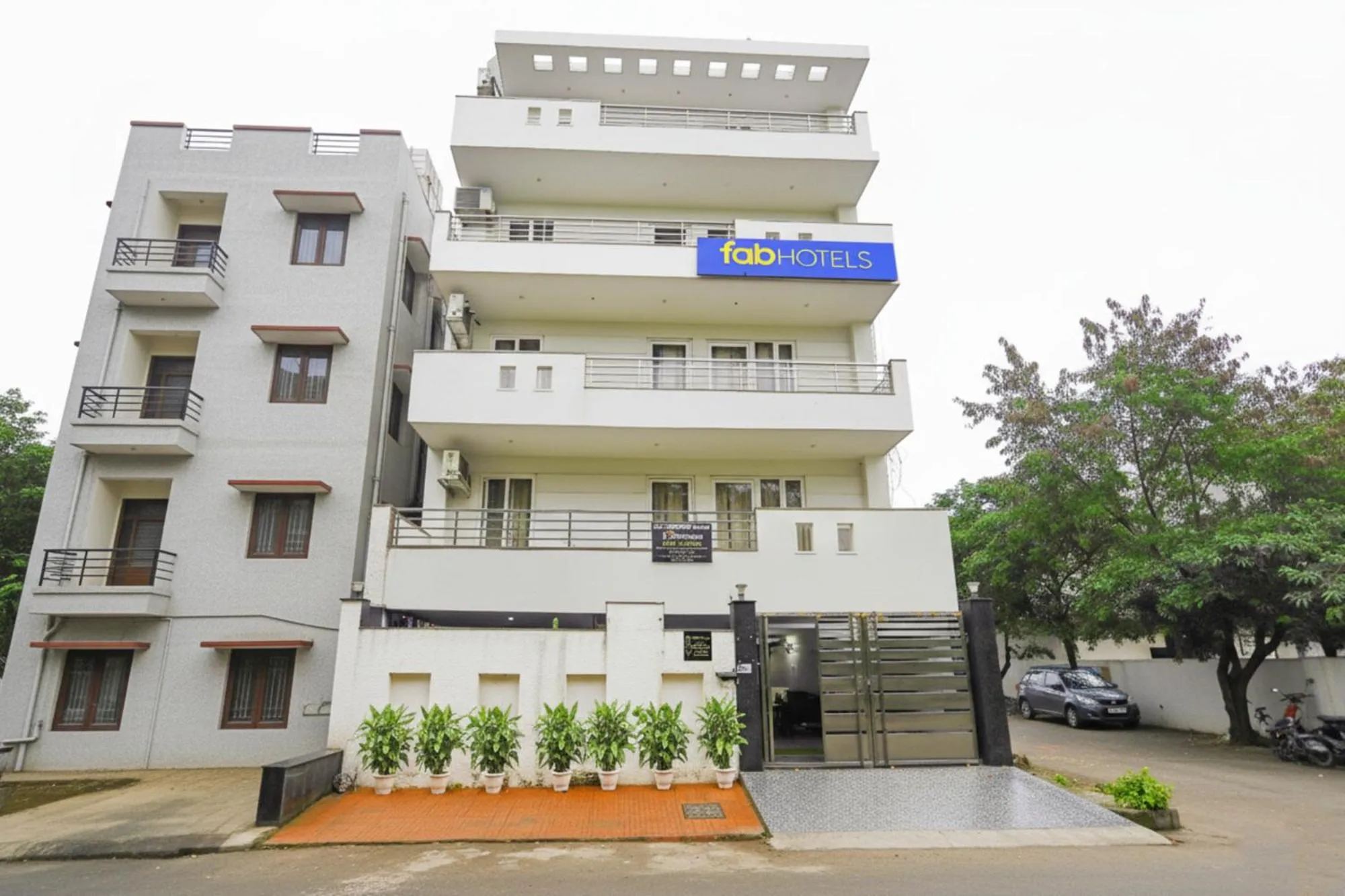 Property building in FabHotel White House BNB - Nr Yashobhoomi Convention Centre