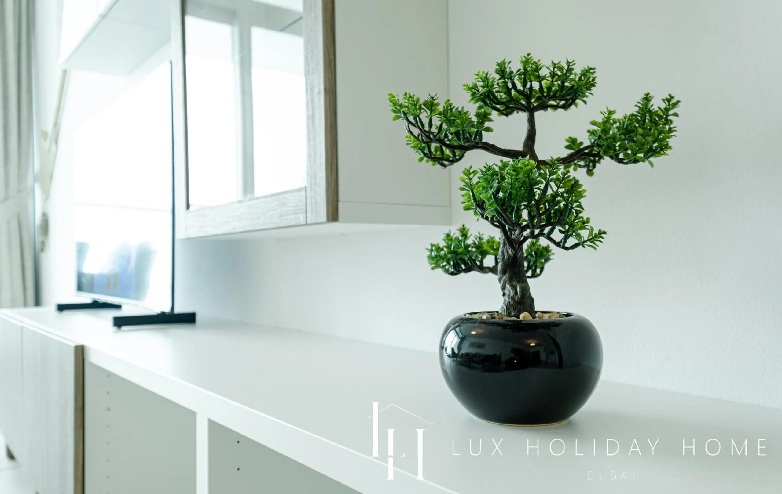 Text overlay in LUX Opulent Island Suite 6 Burj View