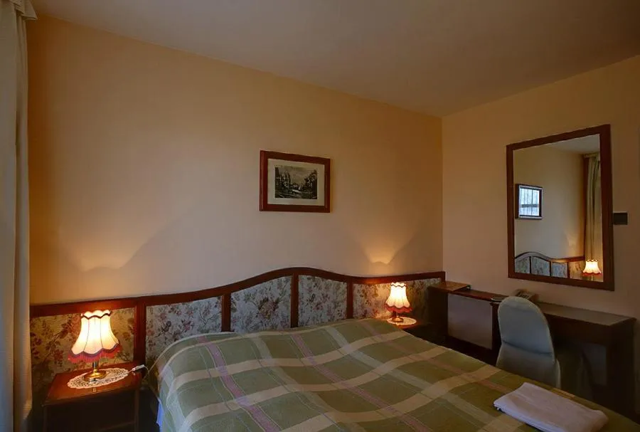 Bed in Hotel Bobbio