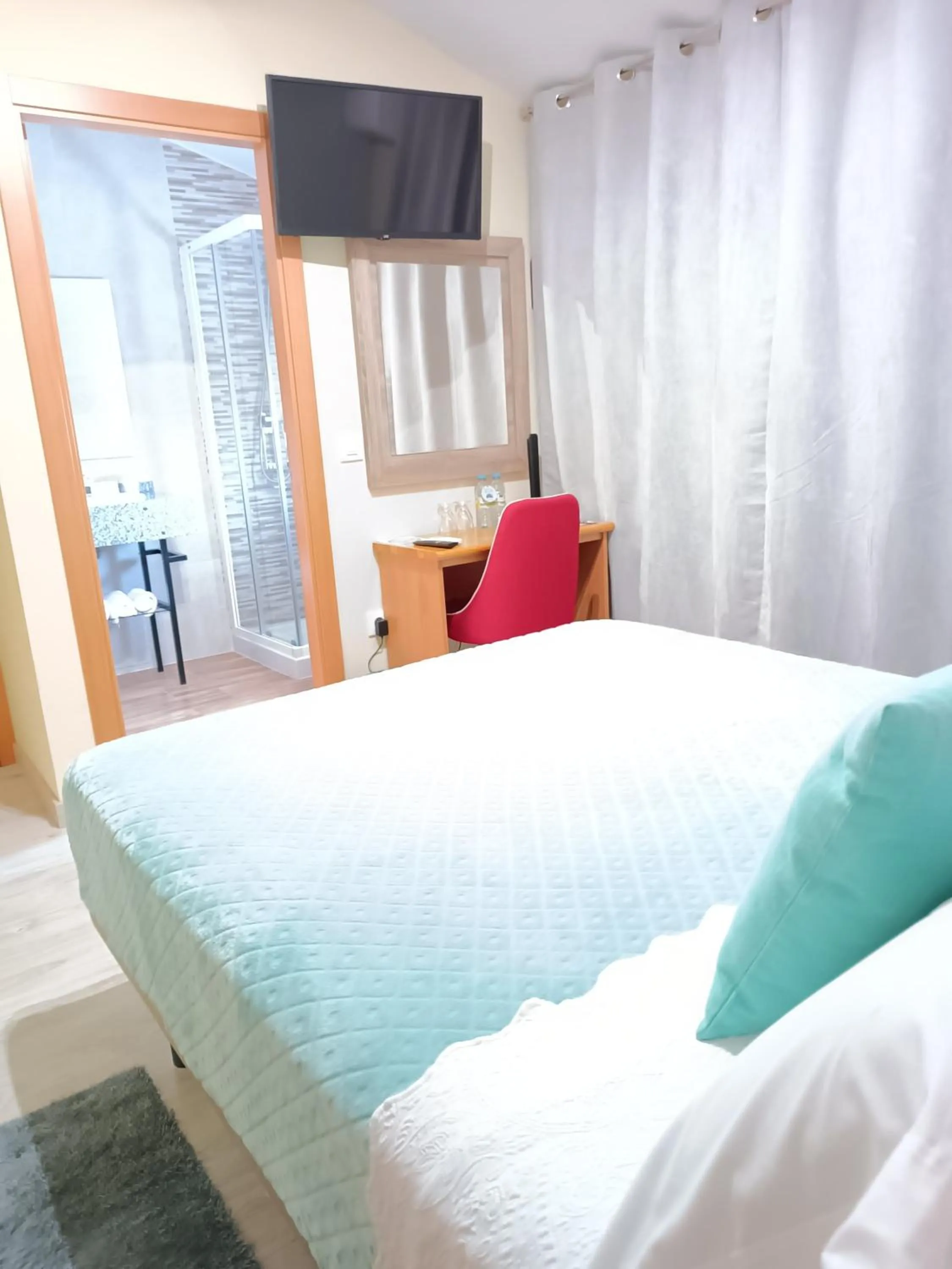 Bed in Hotel Alma Rosa