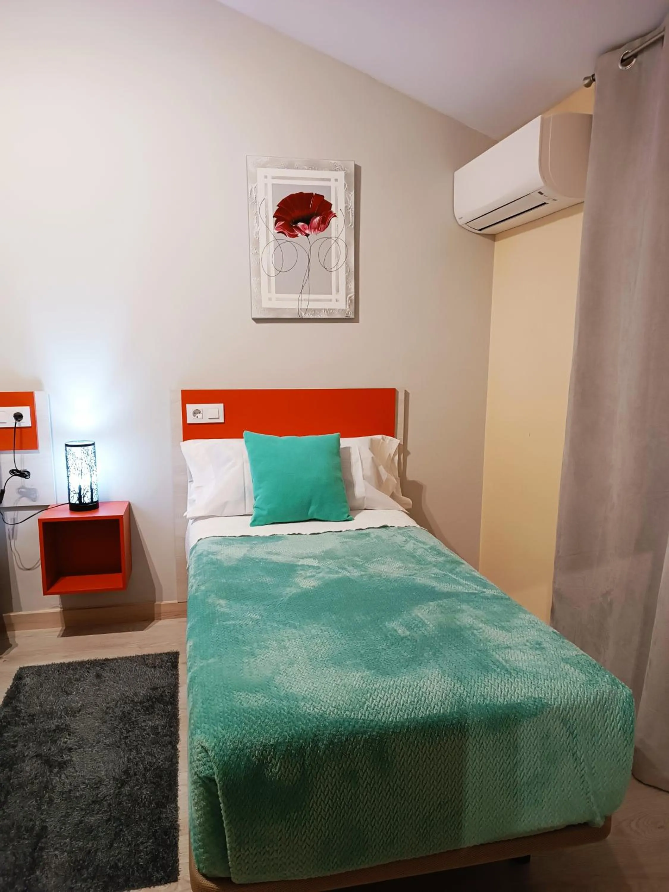 Bed in Hotel Alma Rosa