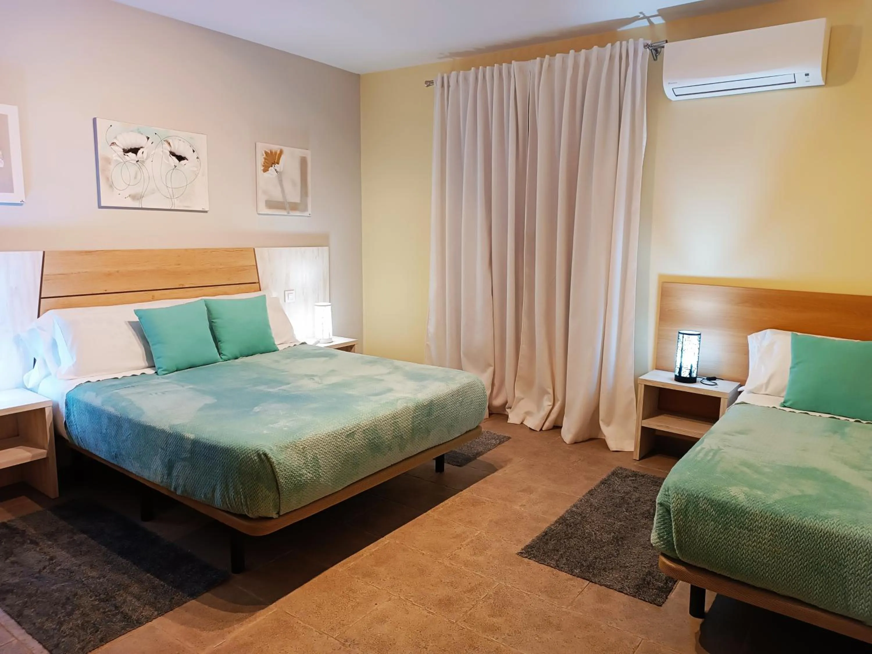 Bed in Hotel Alma Rosa