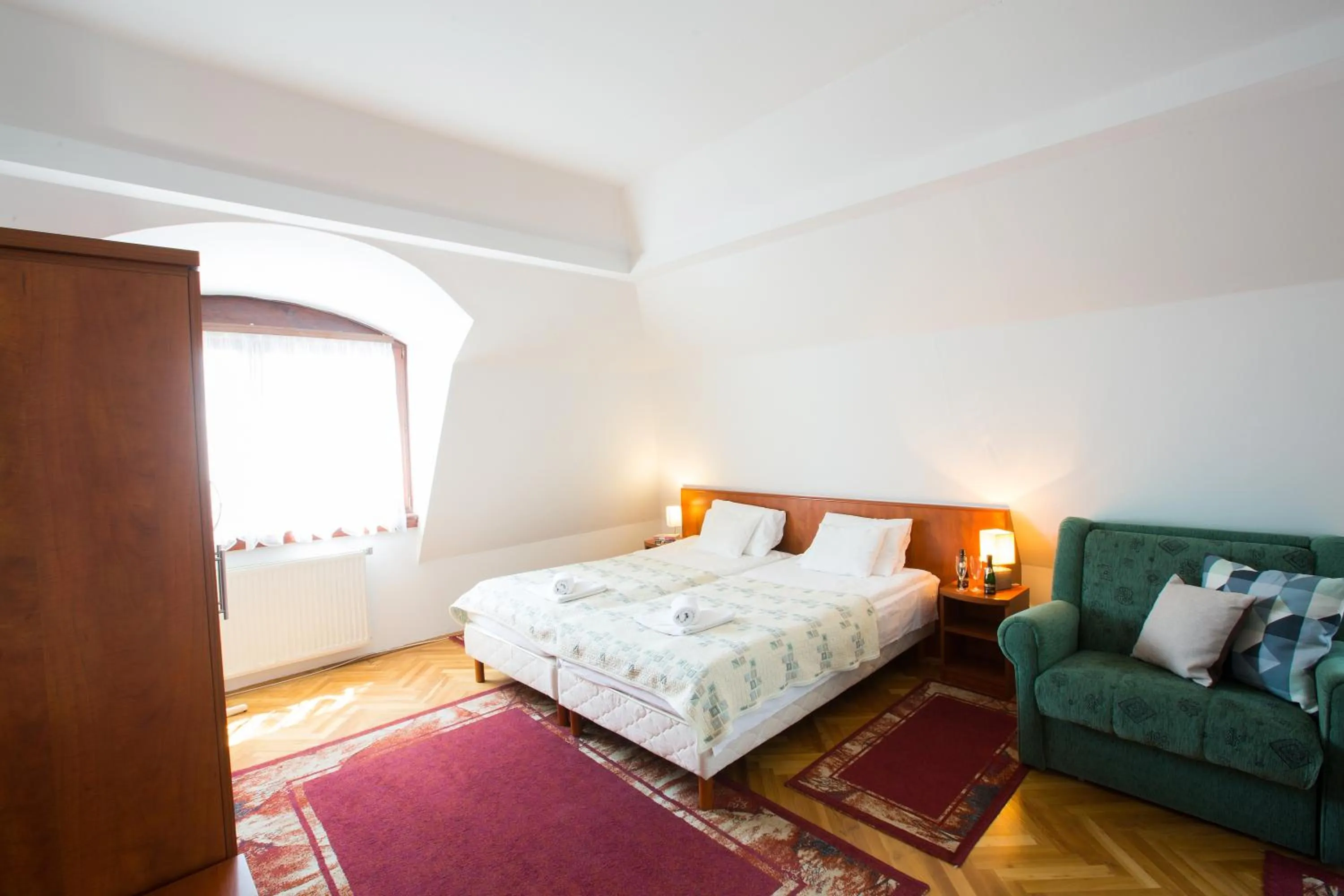 Bed in HELIOS Hotel Apartments