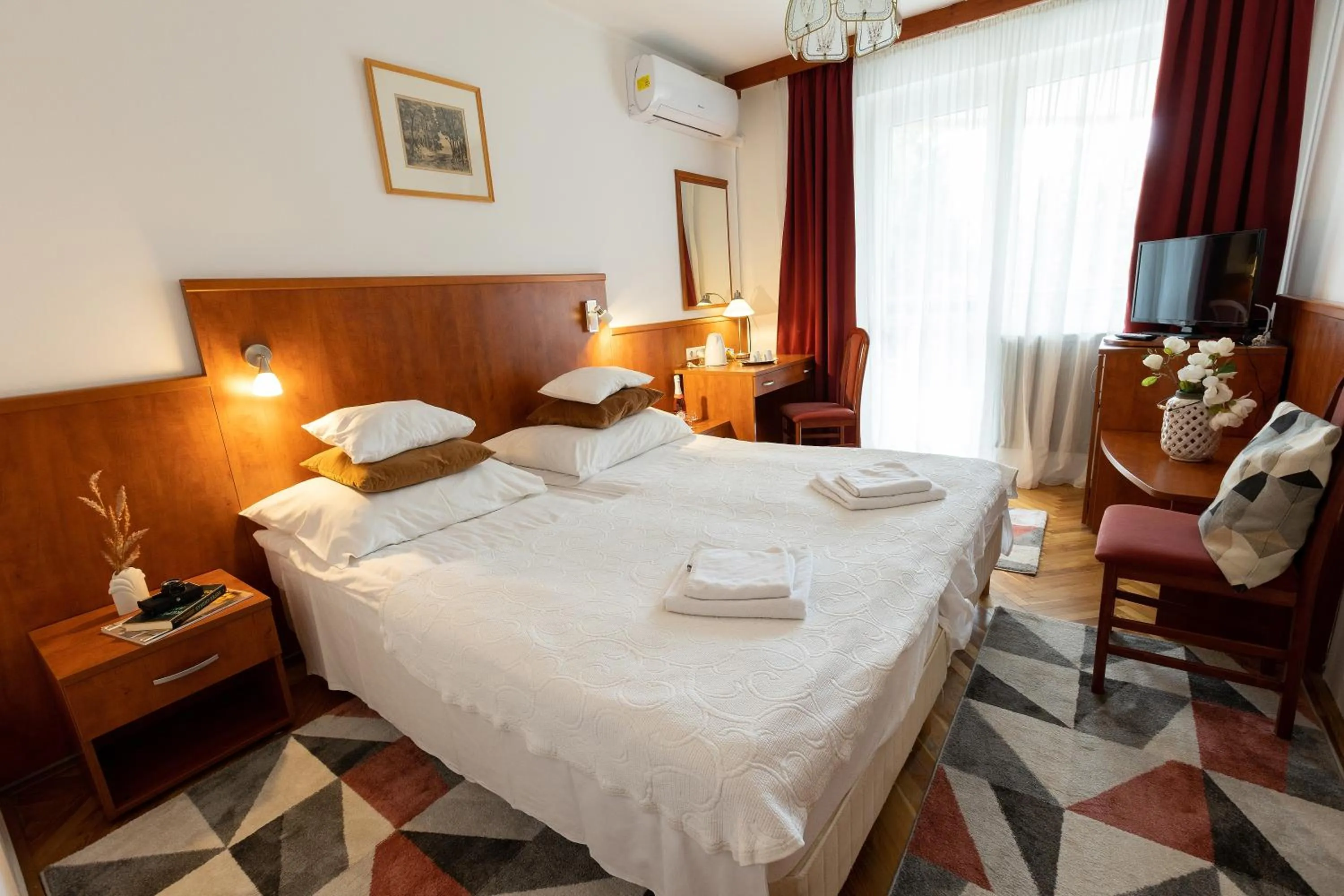 Bed in HELIOS Hotel Apartments