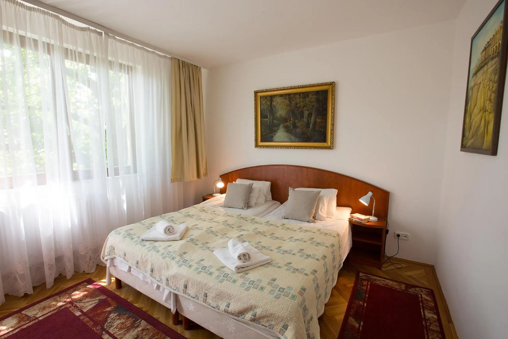 Bed in HELIOS Hotel Apartments