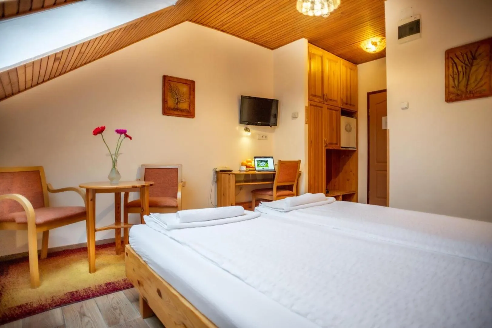 Bed in Hotel Manzard Panzio