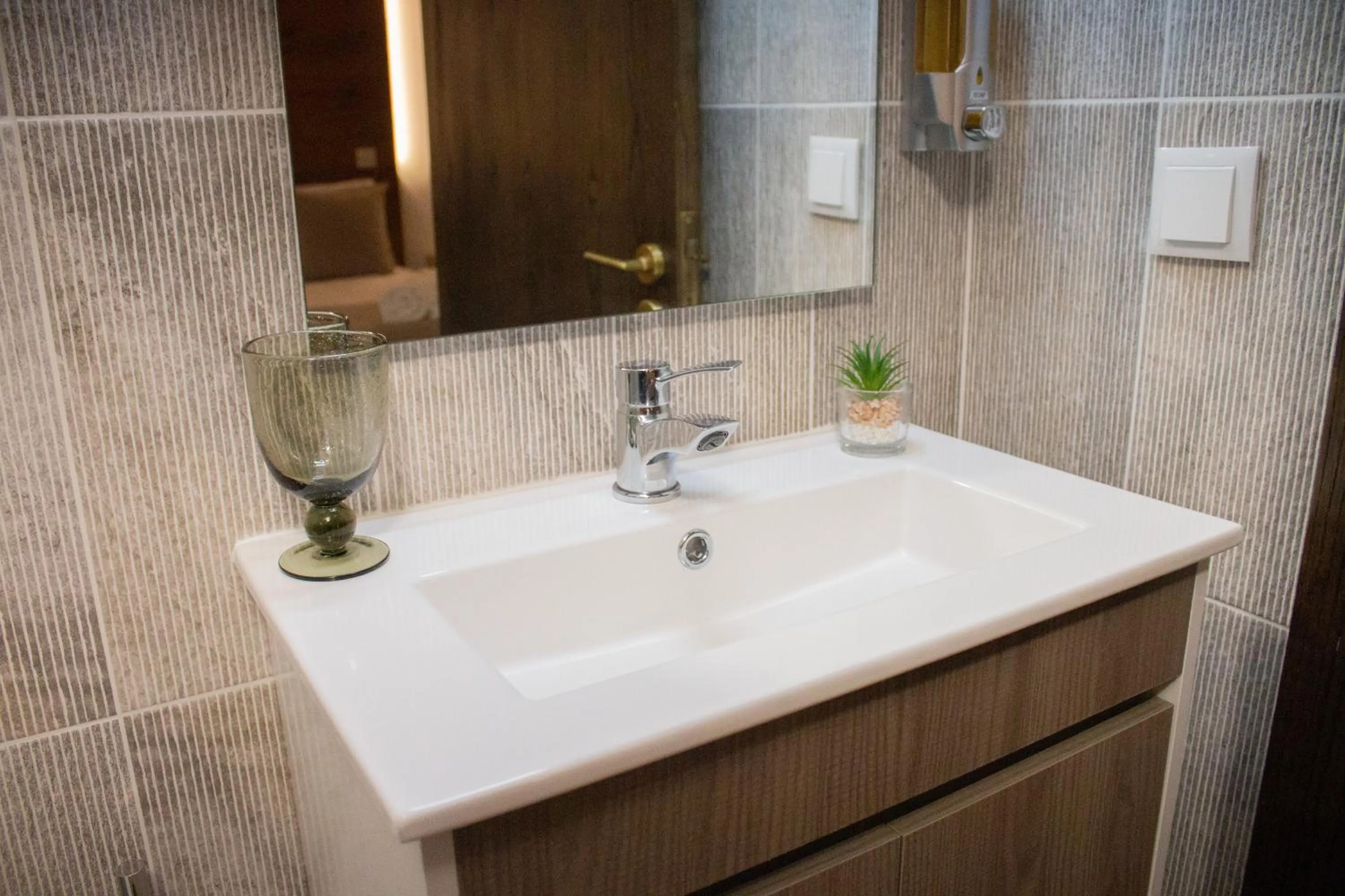 Bathroom in Golden Mirror