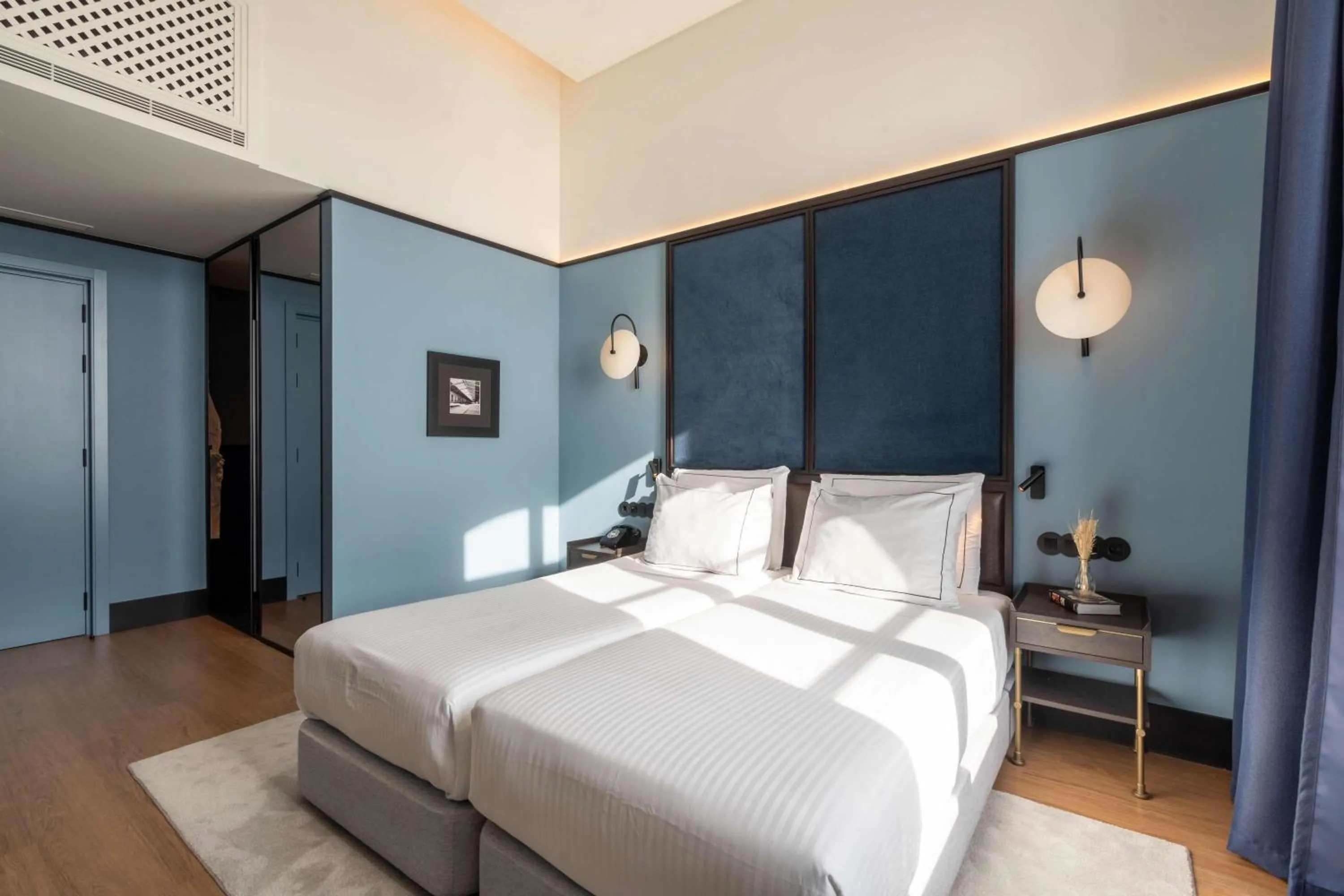 Bedroom, Bed in The Editory Riverside Hotel, an Historic Hotel