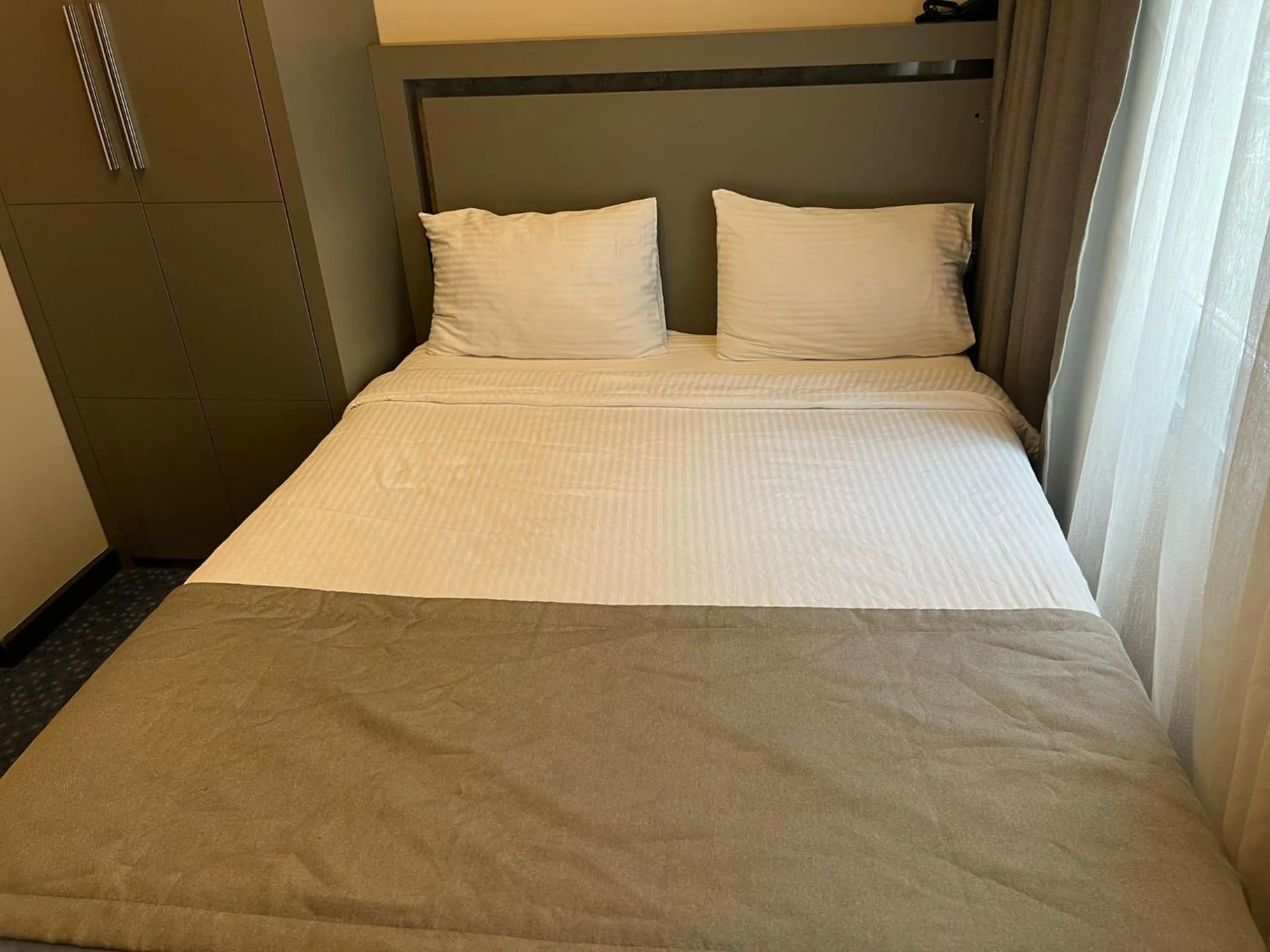 Bed in Acar Suite Hotel