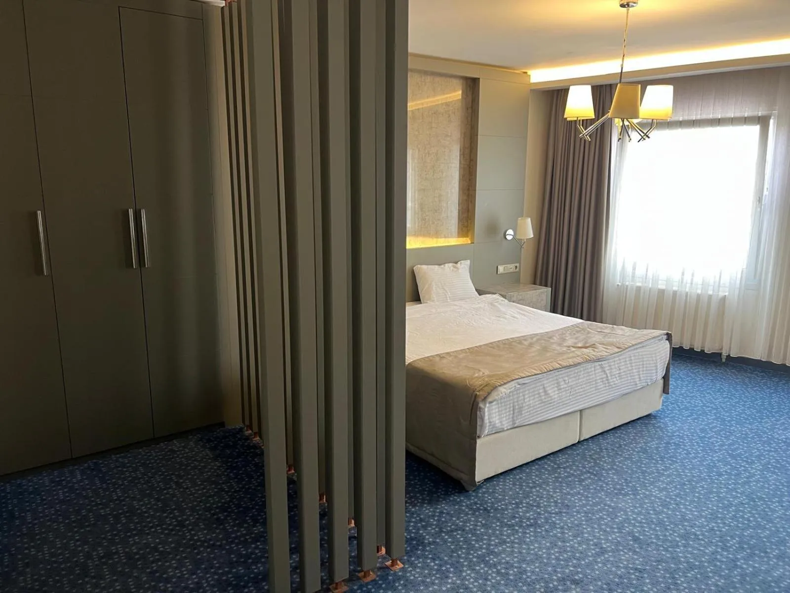 Bed in Acar Suite Hotel