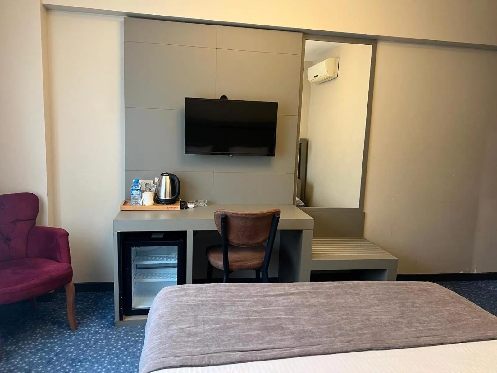 Bed in Acar Suite Hotel