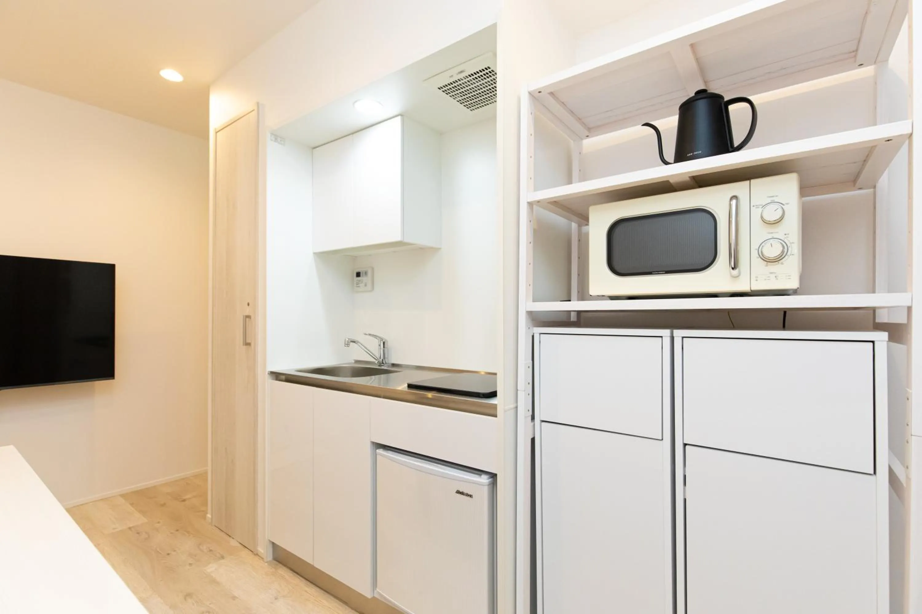 Kitchen or kitchenette in Villa Roppongi