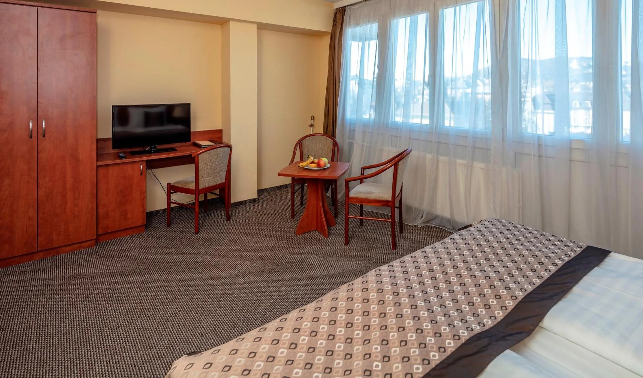 Living room, Bed in Hotel Charles