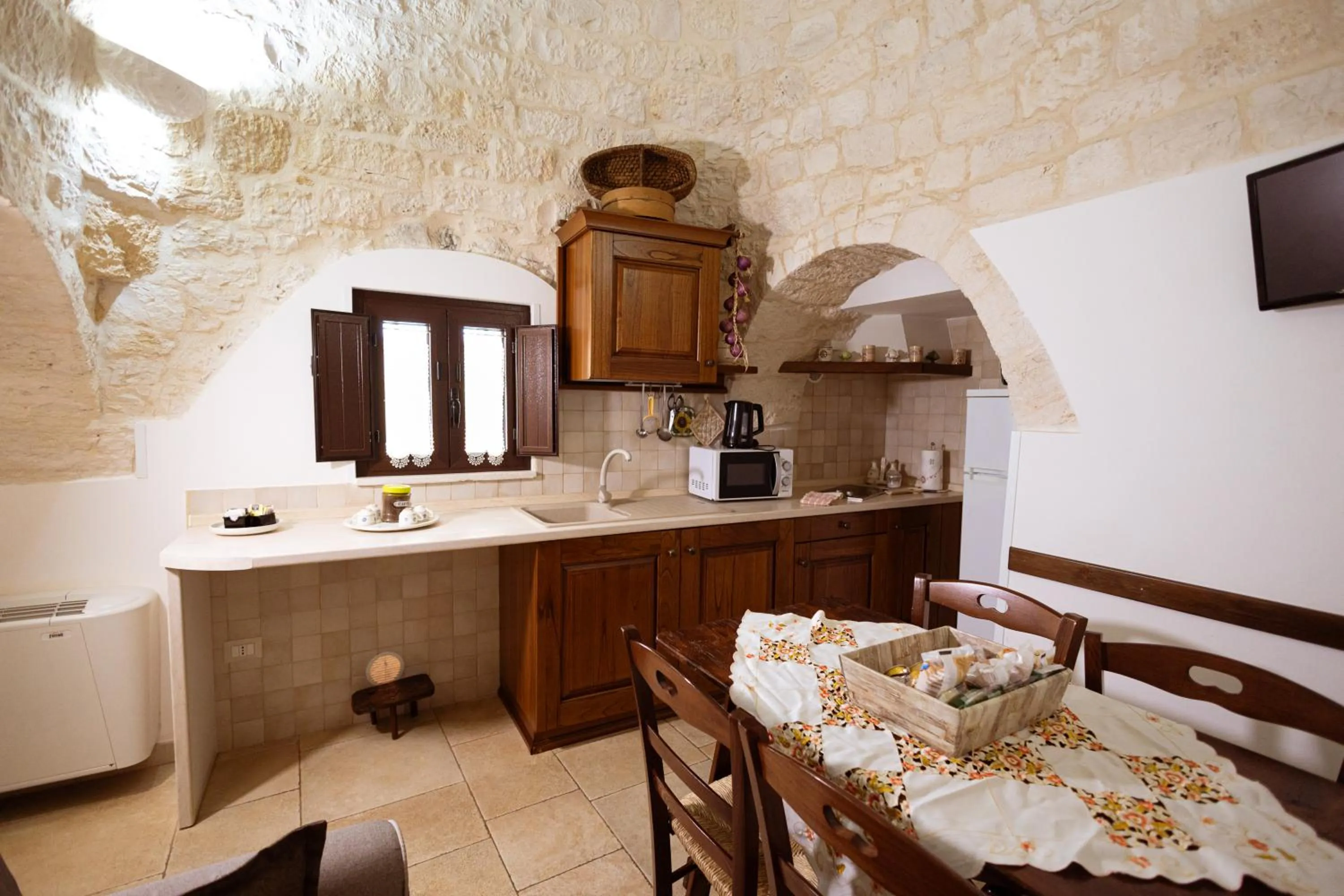 Kitchen or kitchenette in Quei Trulli Divini