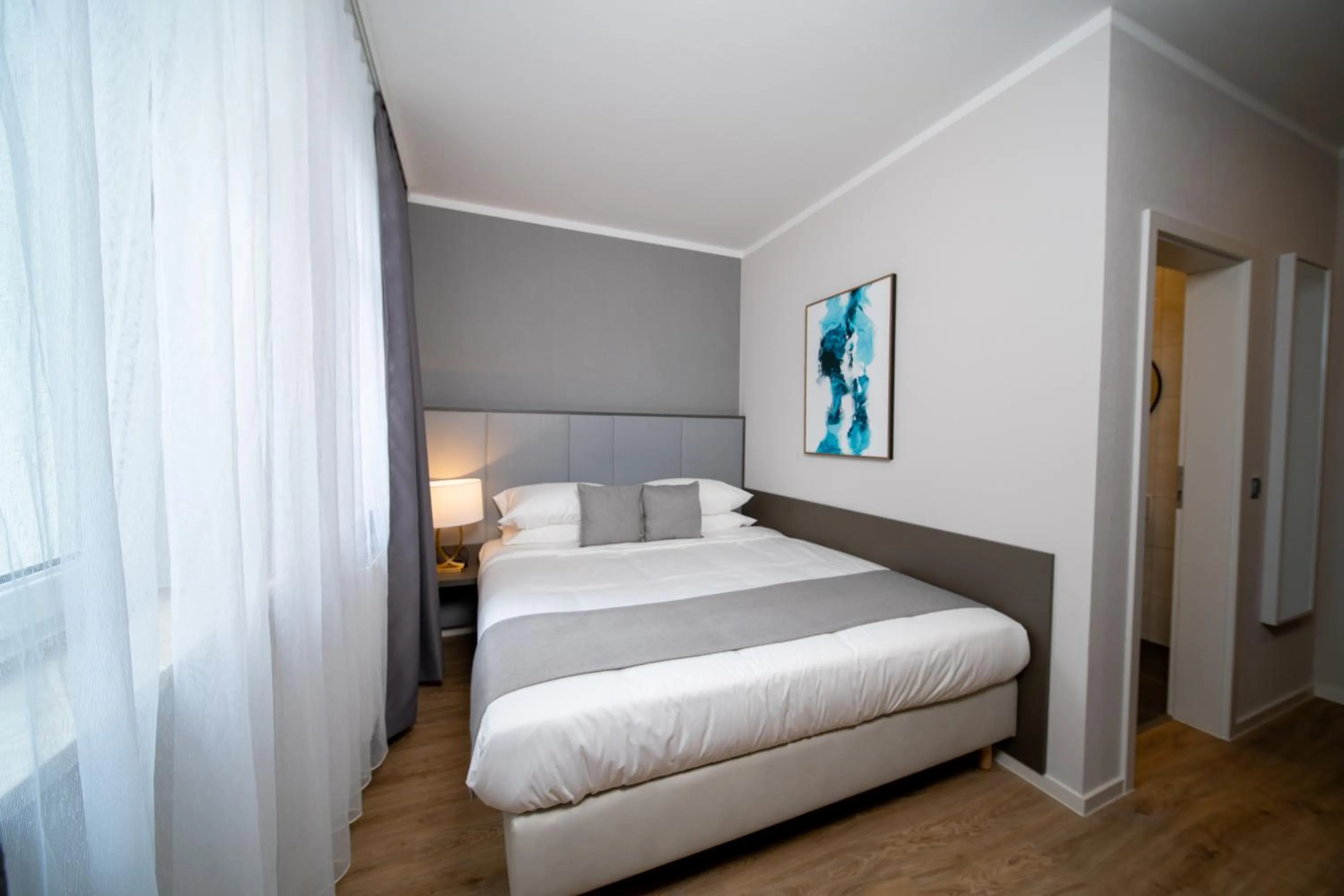 Bed in Emily Hotel Leipzig Neue Messe